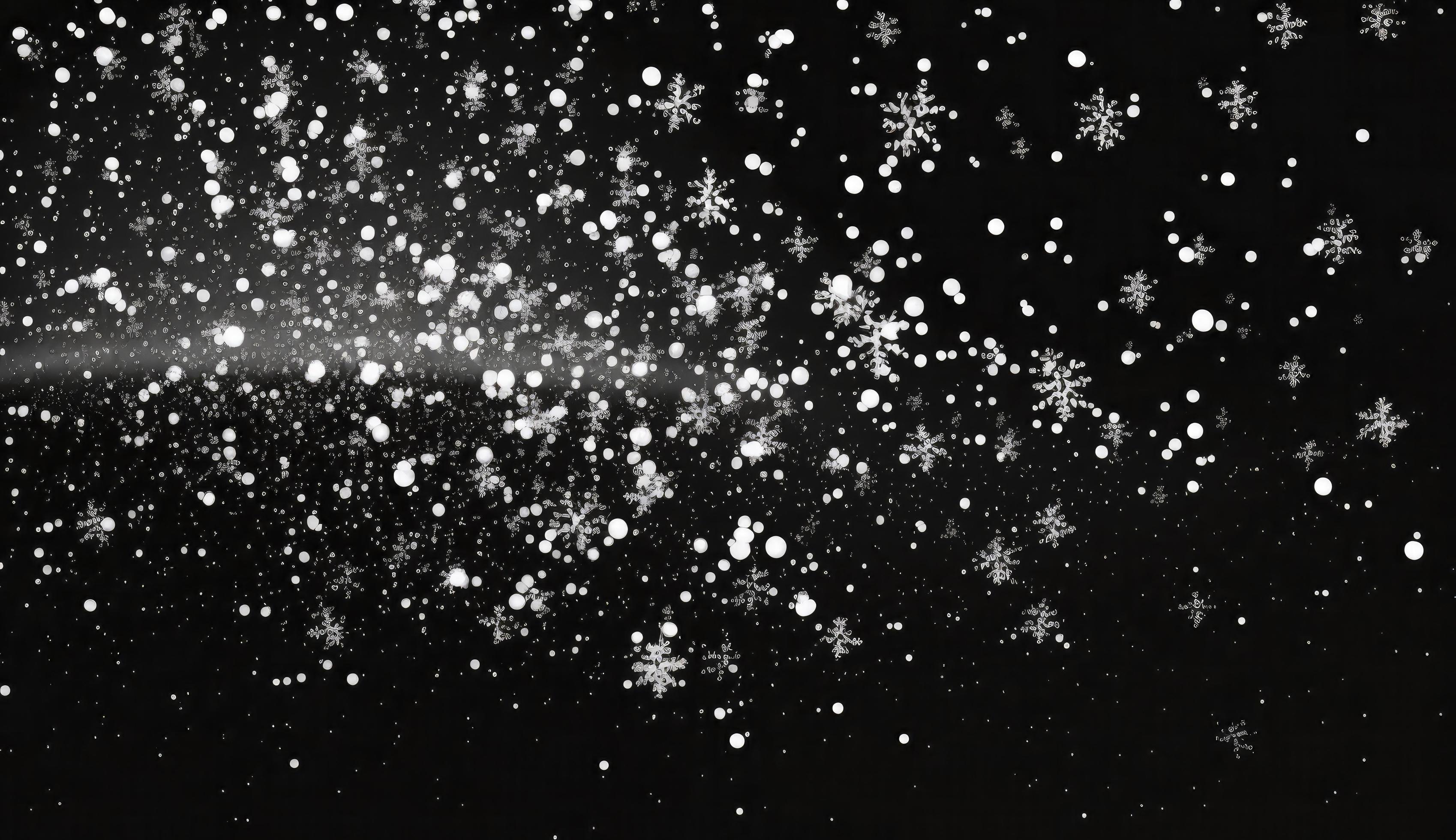 Snowflakes falling down on black background, heavy snow flakes