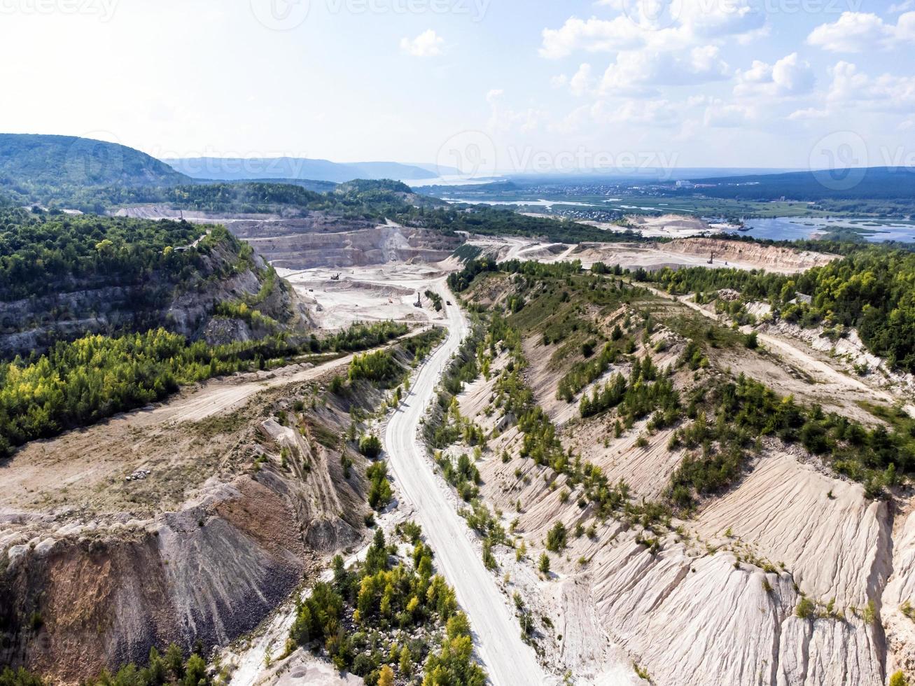 Bird's-eye view of limestone quarry in summer. photo