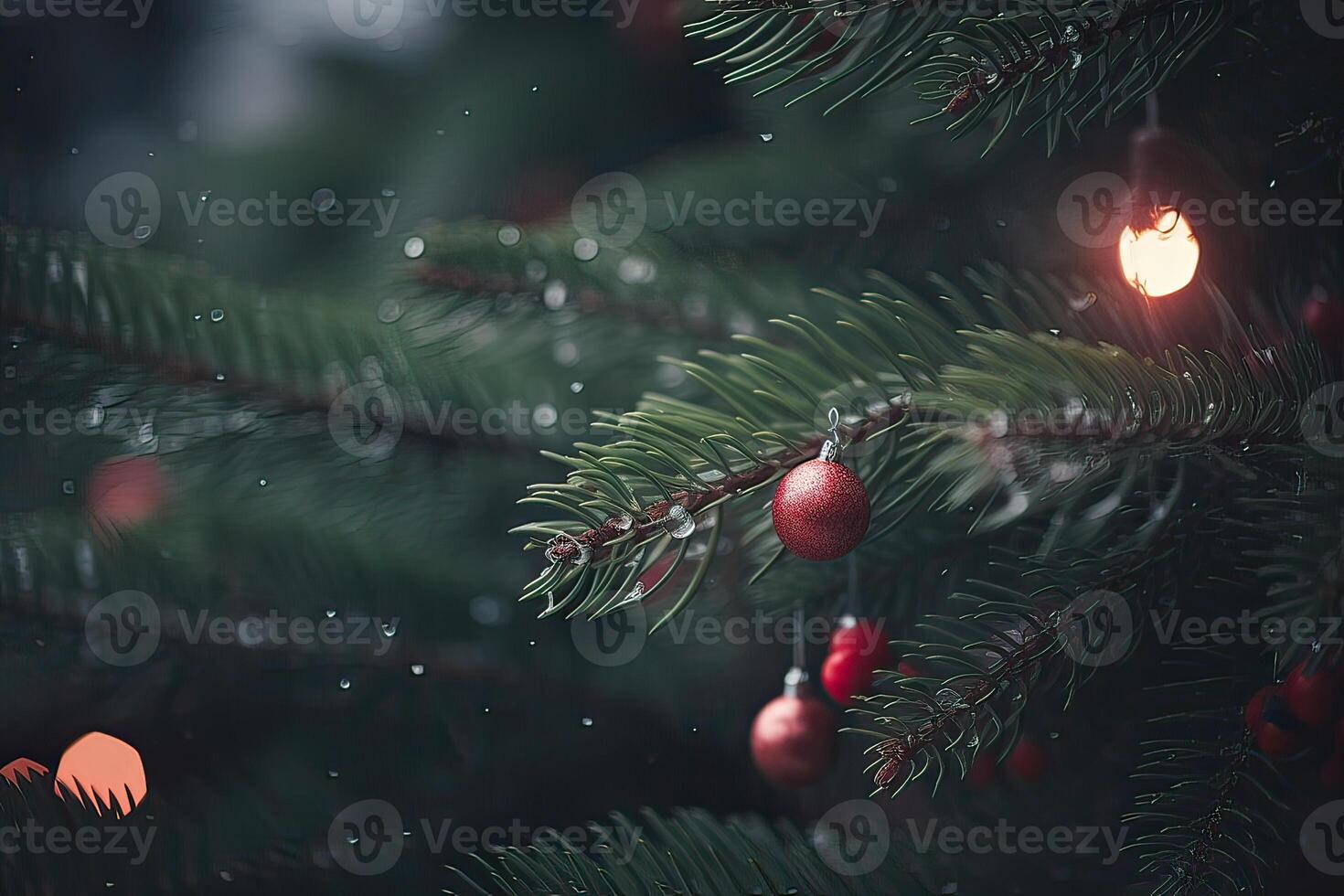 Close up view of beautiful fir branches with shiny colorful bauble or ball, xmas ornaments and lights, christmas holidays background. . photo