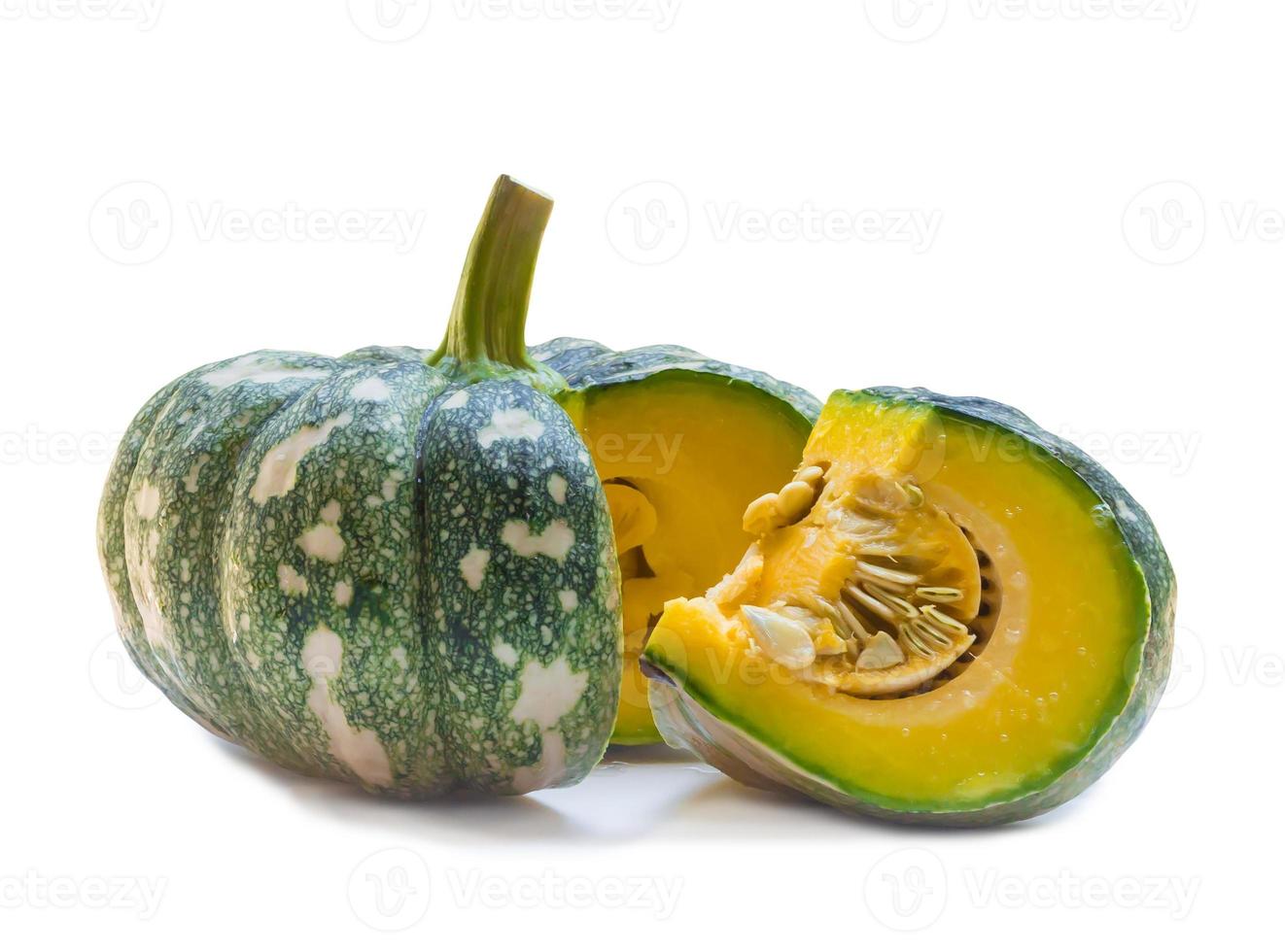 Green pumpkin with strange pattern and slice isolated on white background with clipping path photo