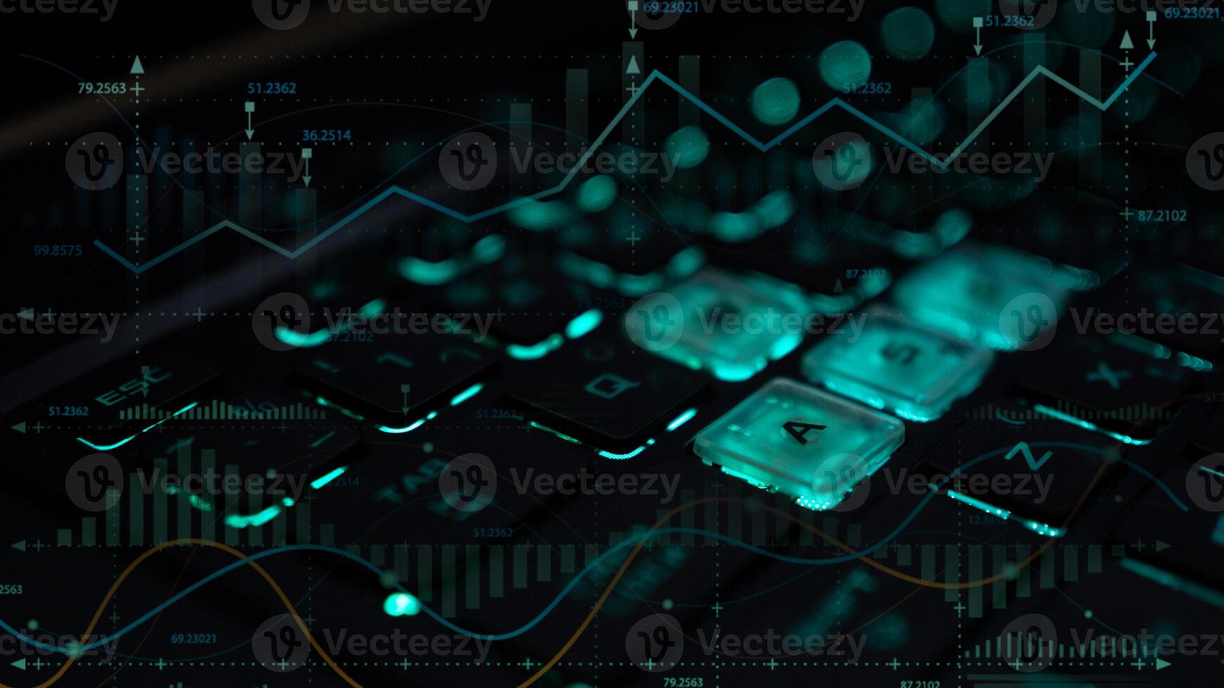 Close-up shot of keyboard with glowing business icons. Concept of business, finance, investment. . photo
