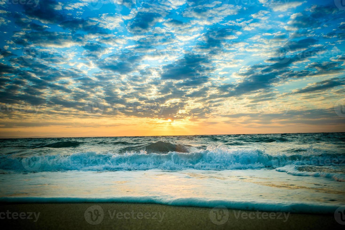 Beautiful dramatic sky over the beach photo