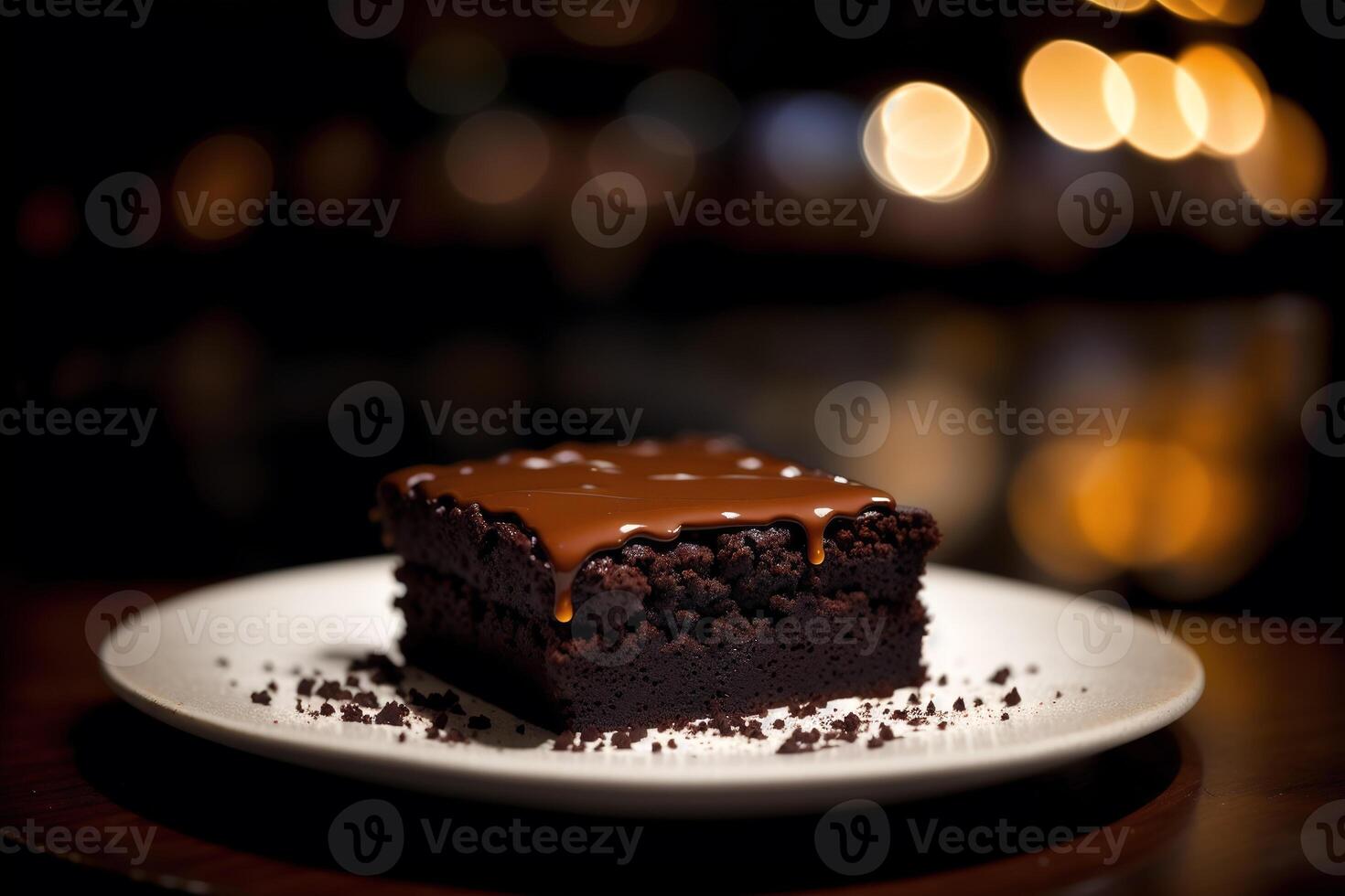 Piece of cake on a white plate on a wooden table. Homemade cake with nuts and honey. photo