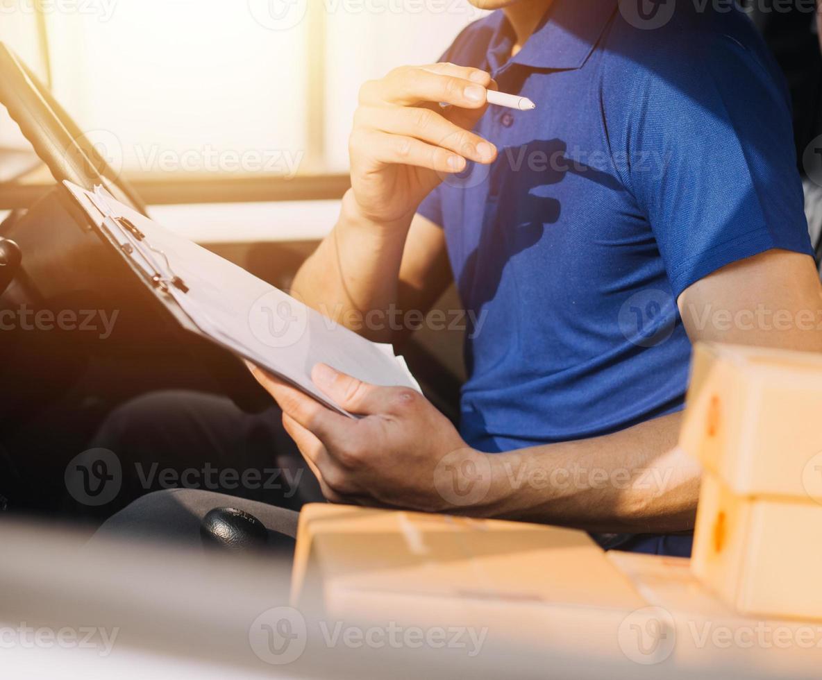 Business woman start up small business entrepreneur SME success .freelance woman working at home with Online Parcel delivery. SME and packaging deliveryconcept photo