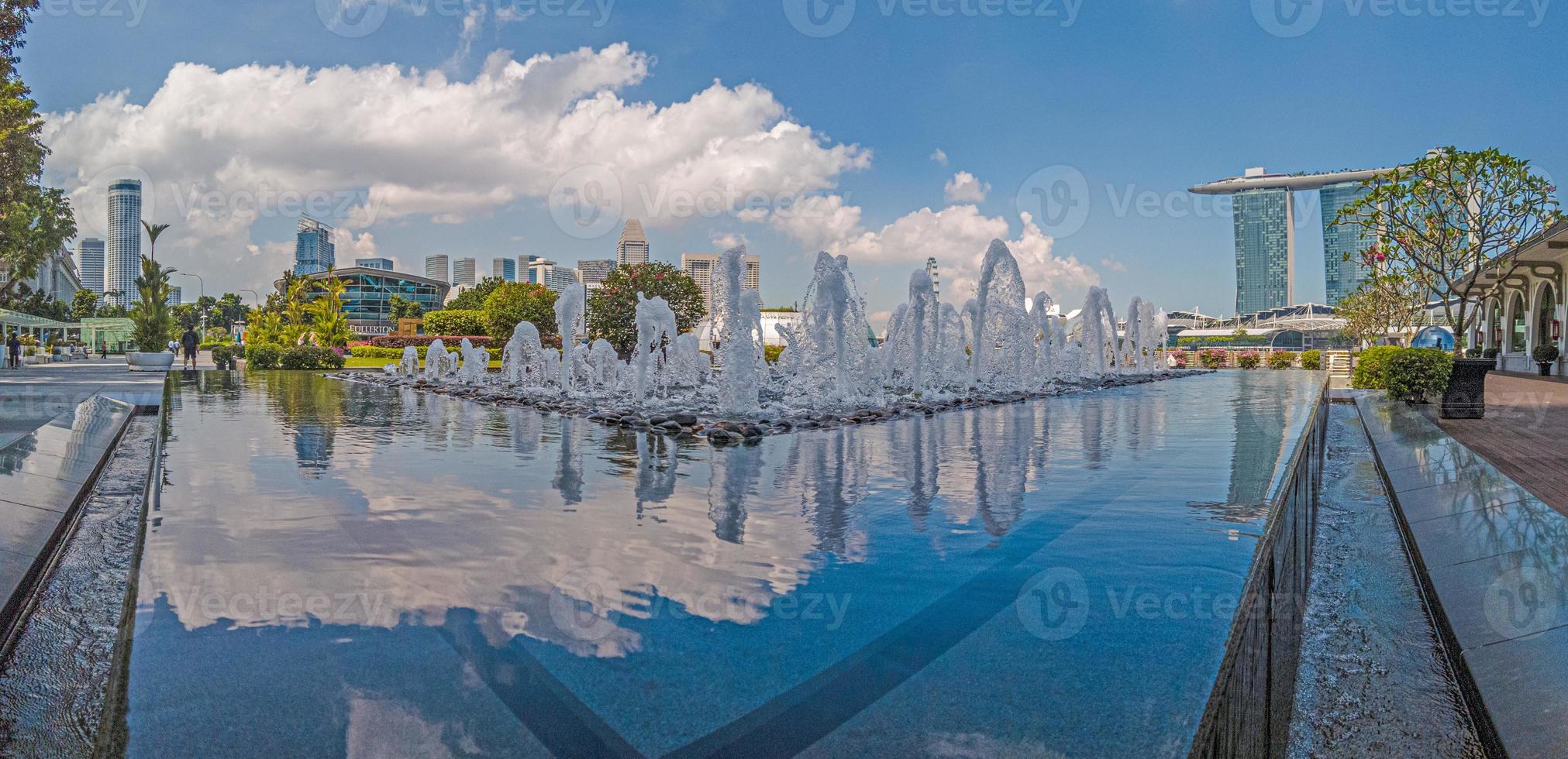 Panoramic view over fountain at Clifford Square in Singapore photo