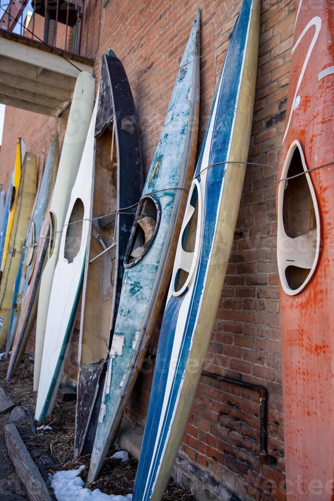 Canoes tied up in a row photo