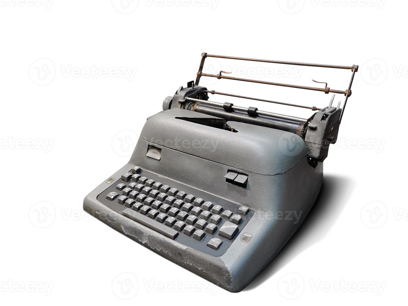 Old electric typewriter isolated on white background photo