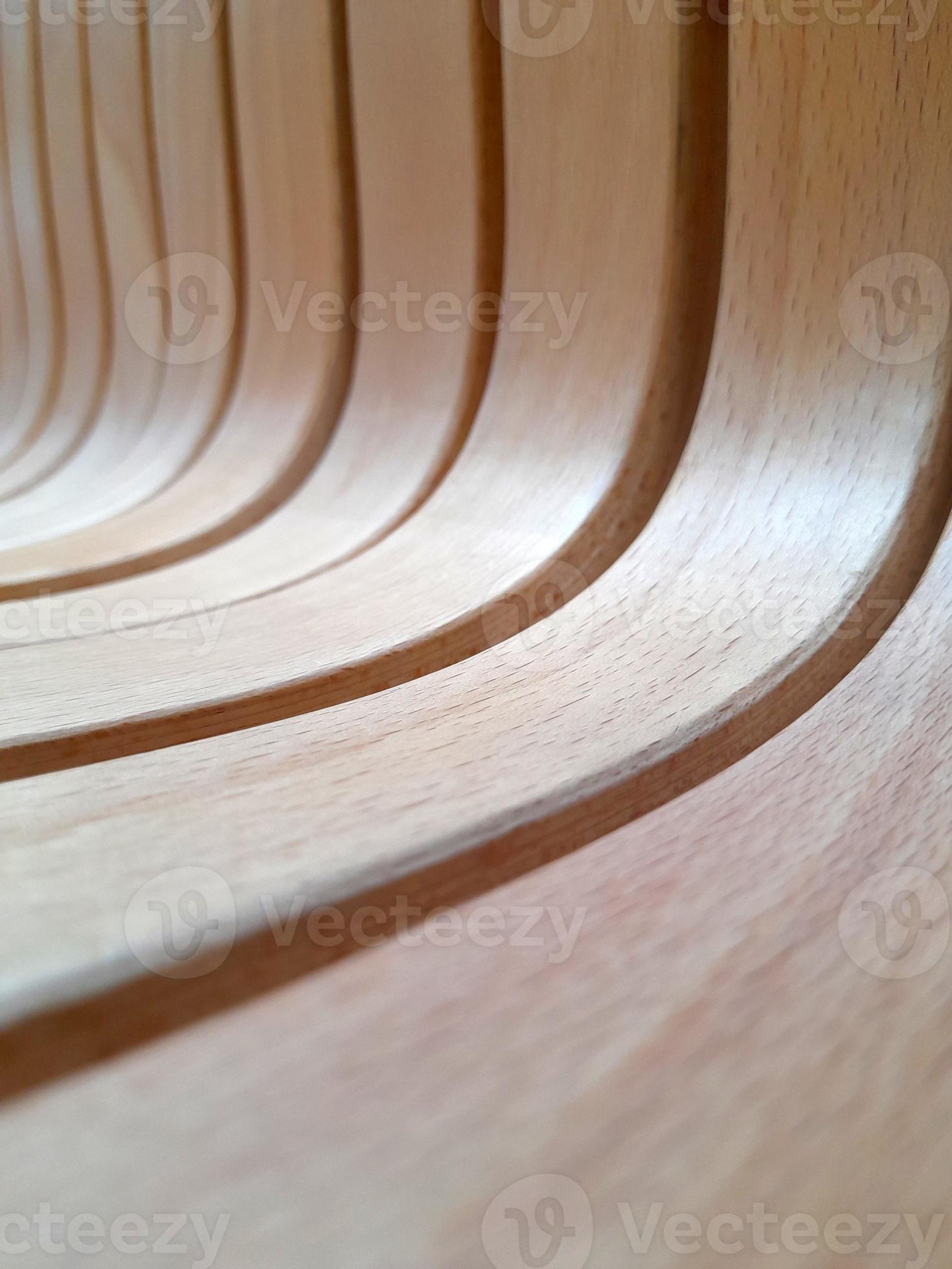 Curved wooden slats. Curved beams of light wood. creative wood