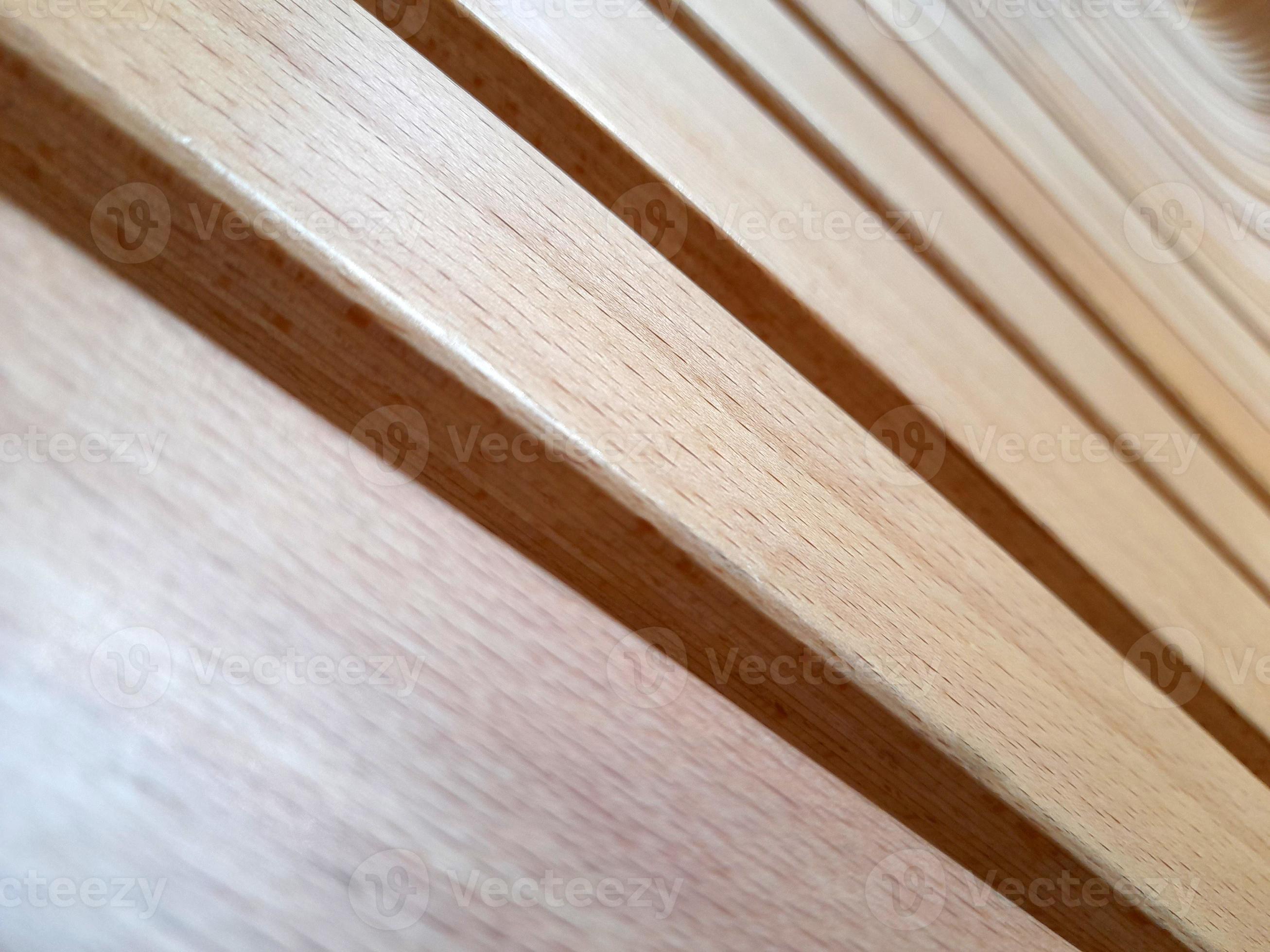 Curved wooden slats. Curved beams of light wood. creative wood