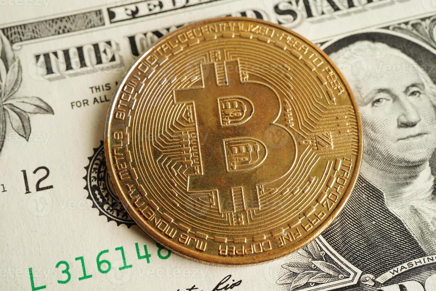 Golden bitcoin on US dollar banknotes money for business and commercial, Digital currency, Virtual cryptocurrency, blockchain technology. photo