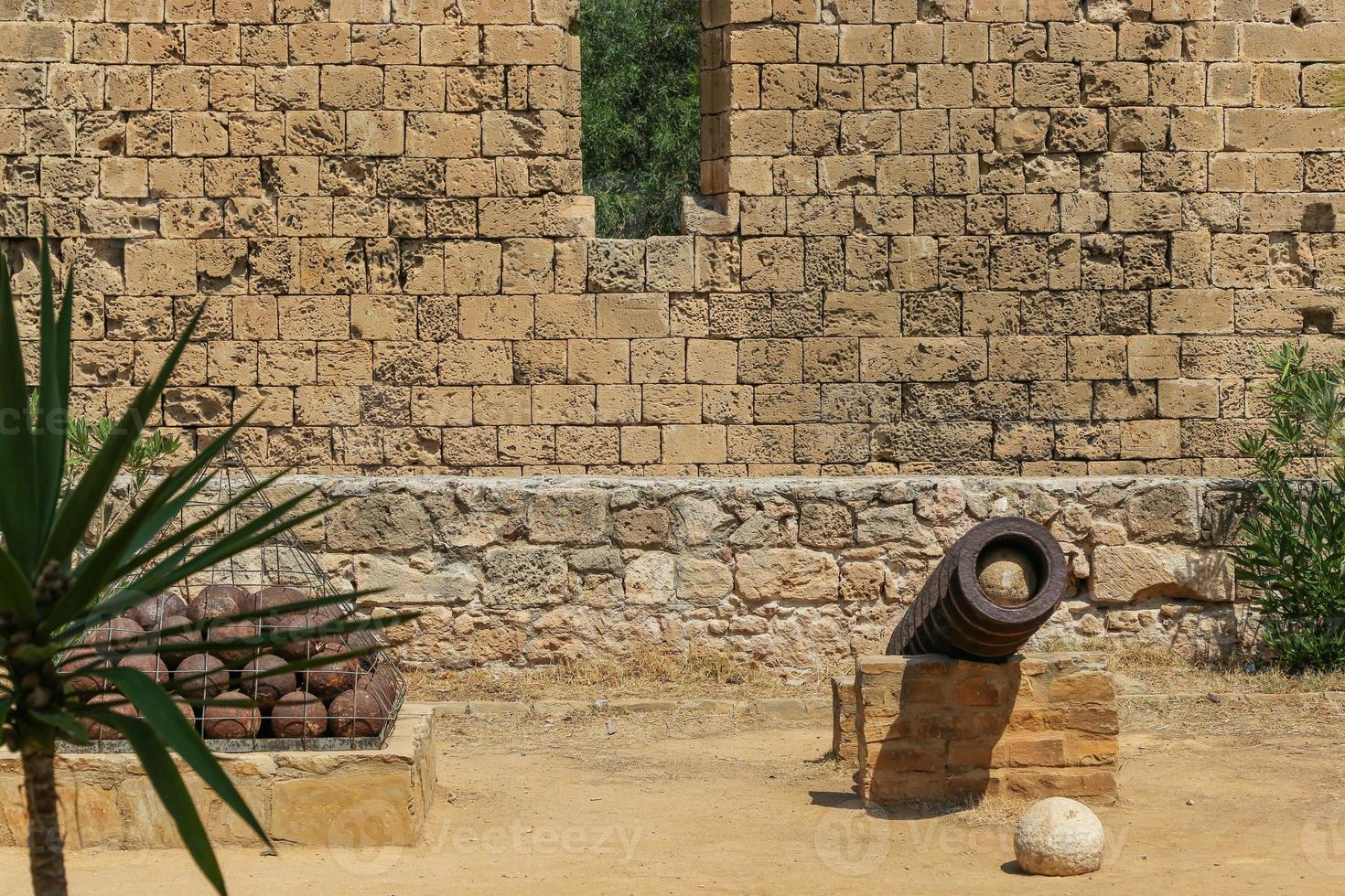 Historic cannon and cannonballs in city Famagusta, Cyprus photo