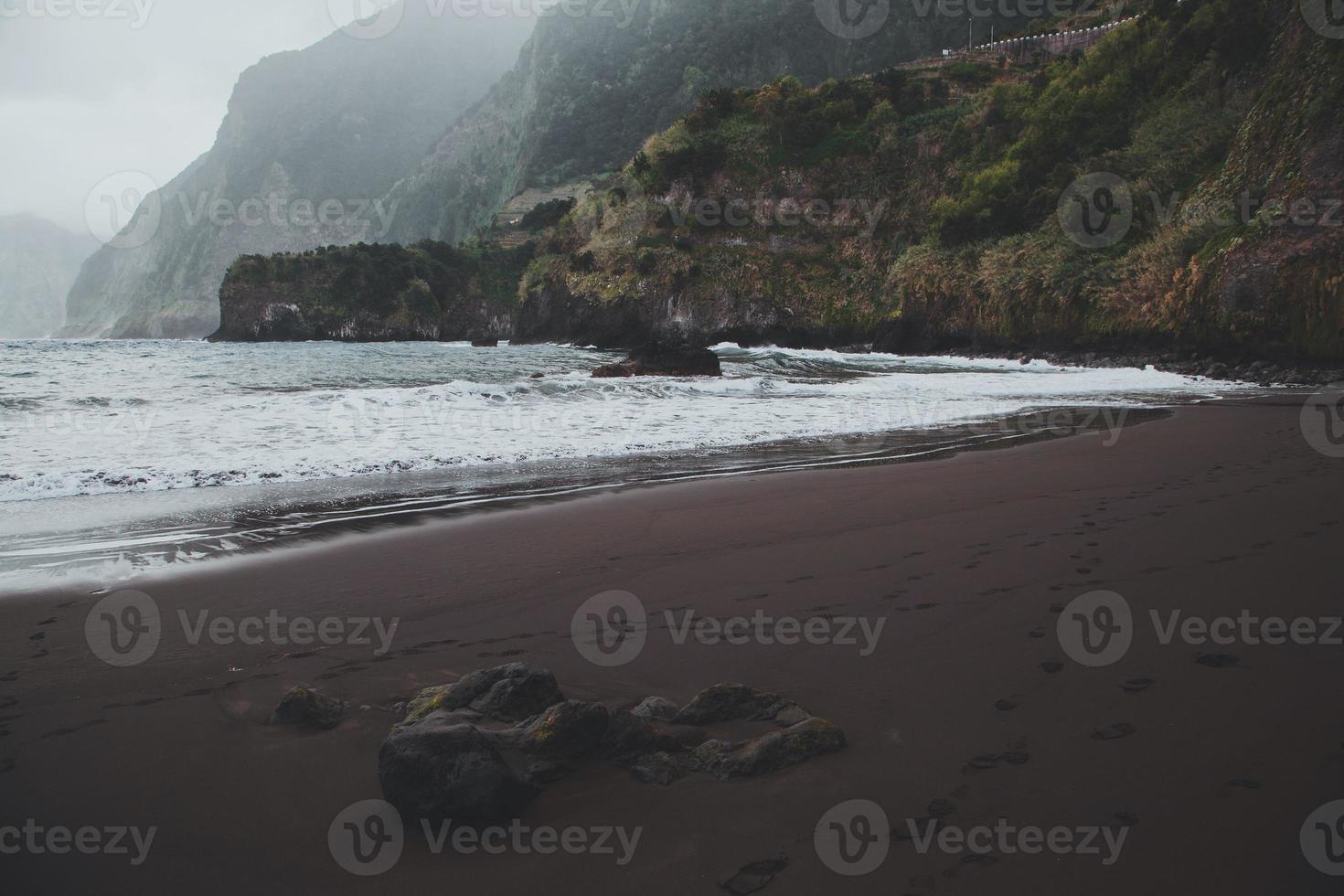 Waves at Seixal beach in Madeira, Portugal photo