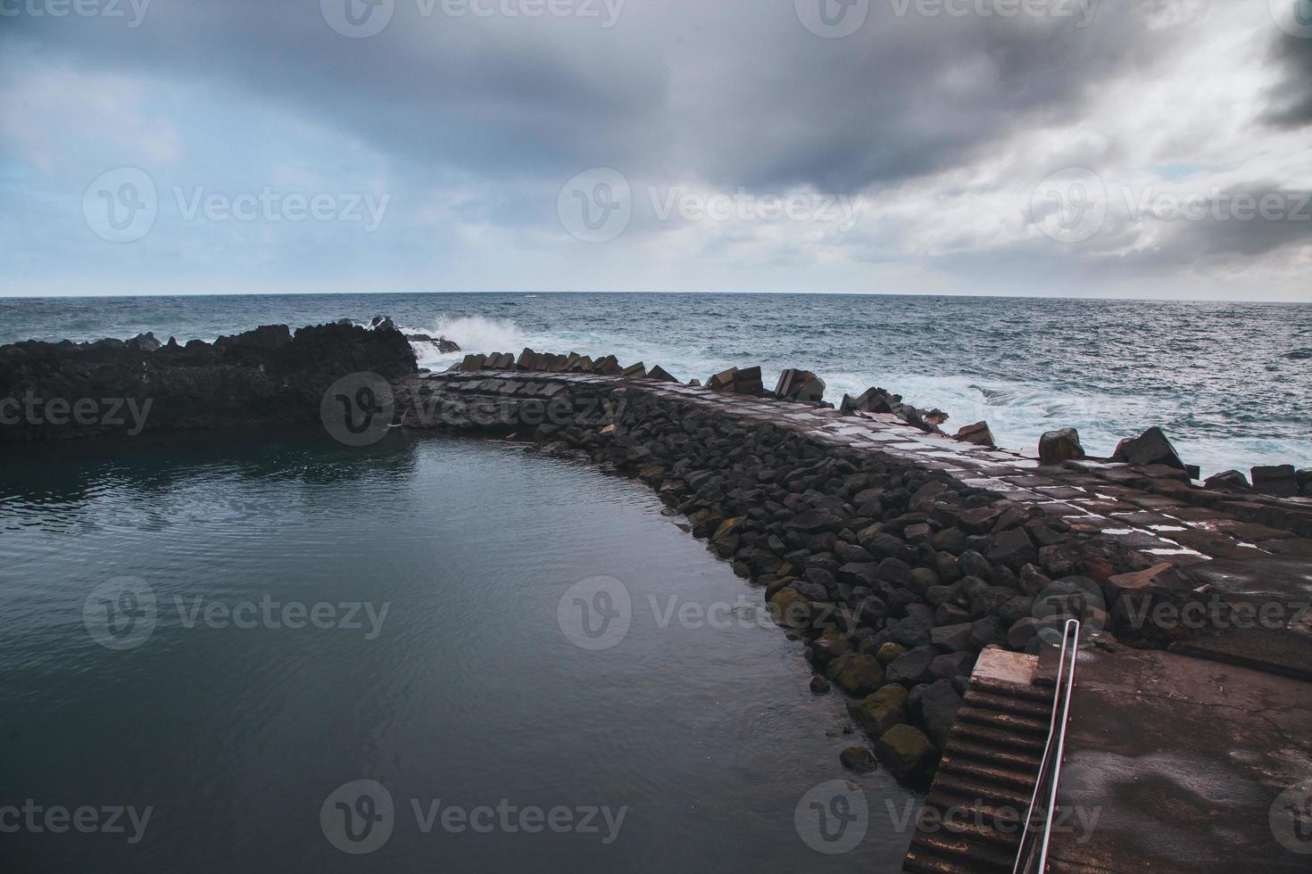 Waves at Seixal beach in Madeira, Portugal photo