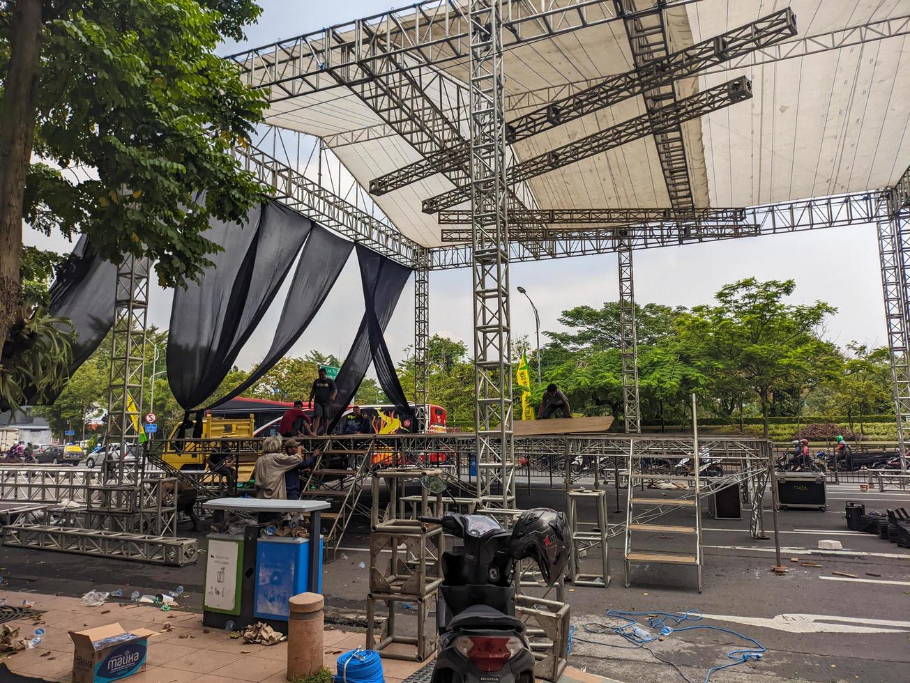 a stage being built for an event in surabaya, indonesia photo