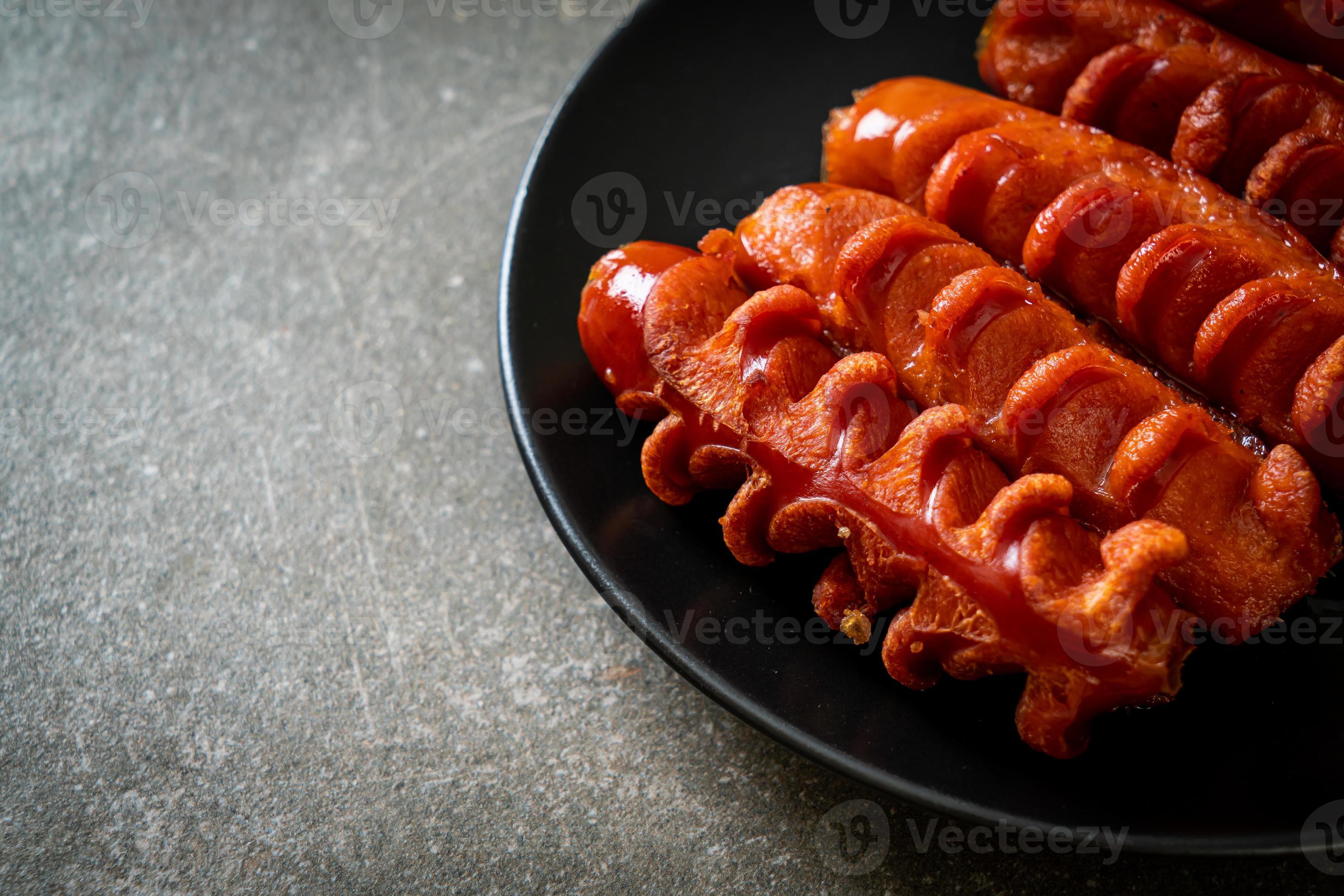 deep fried sausage skewer on plate 22977555 Stock Photo at Vecteezy