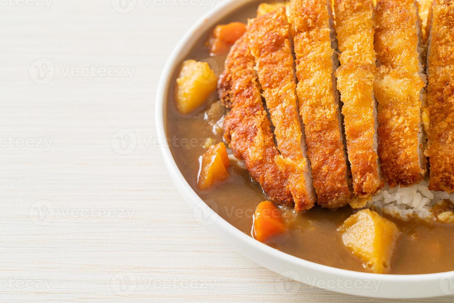 curry rice with fried pork cutlet and creamy omelet photo