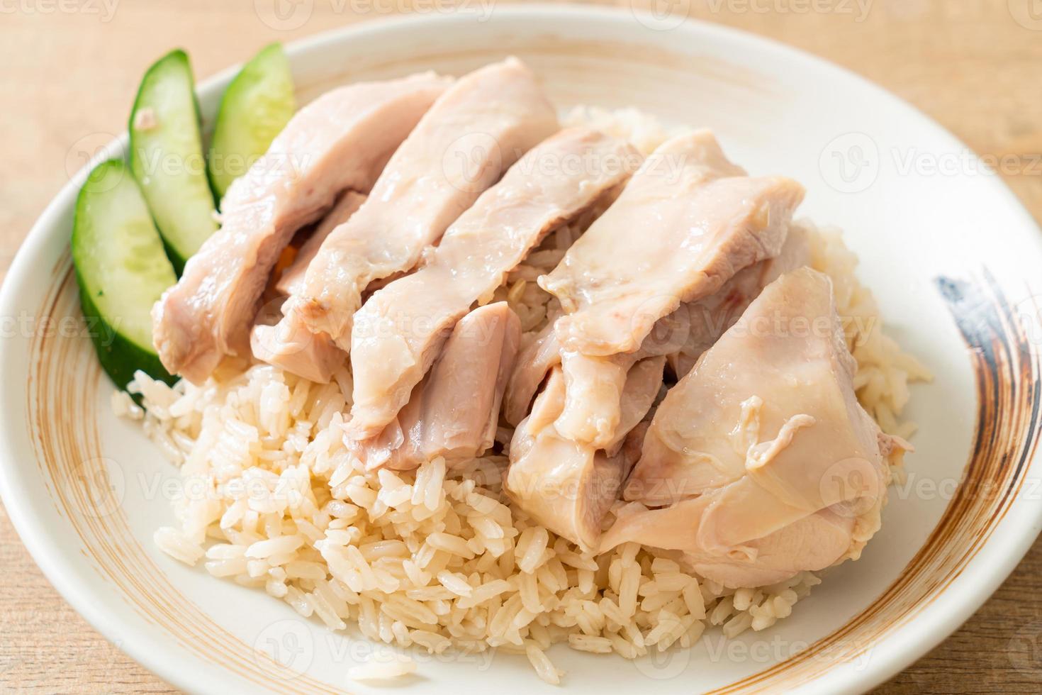 Hainanese chicken rice or rice steamed with chicken soup photo