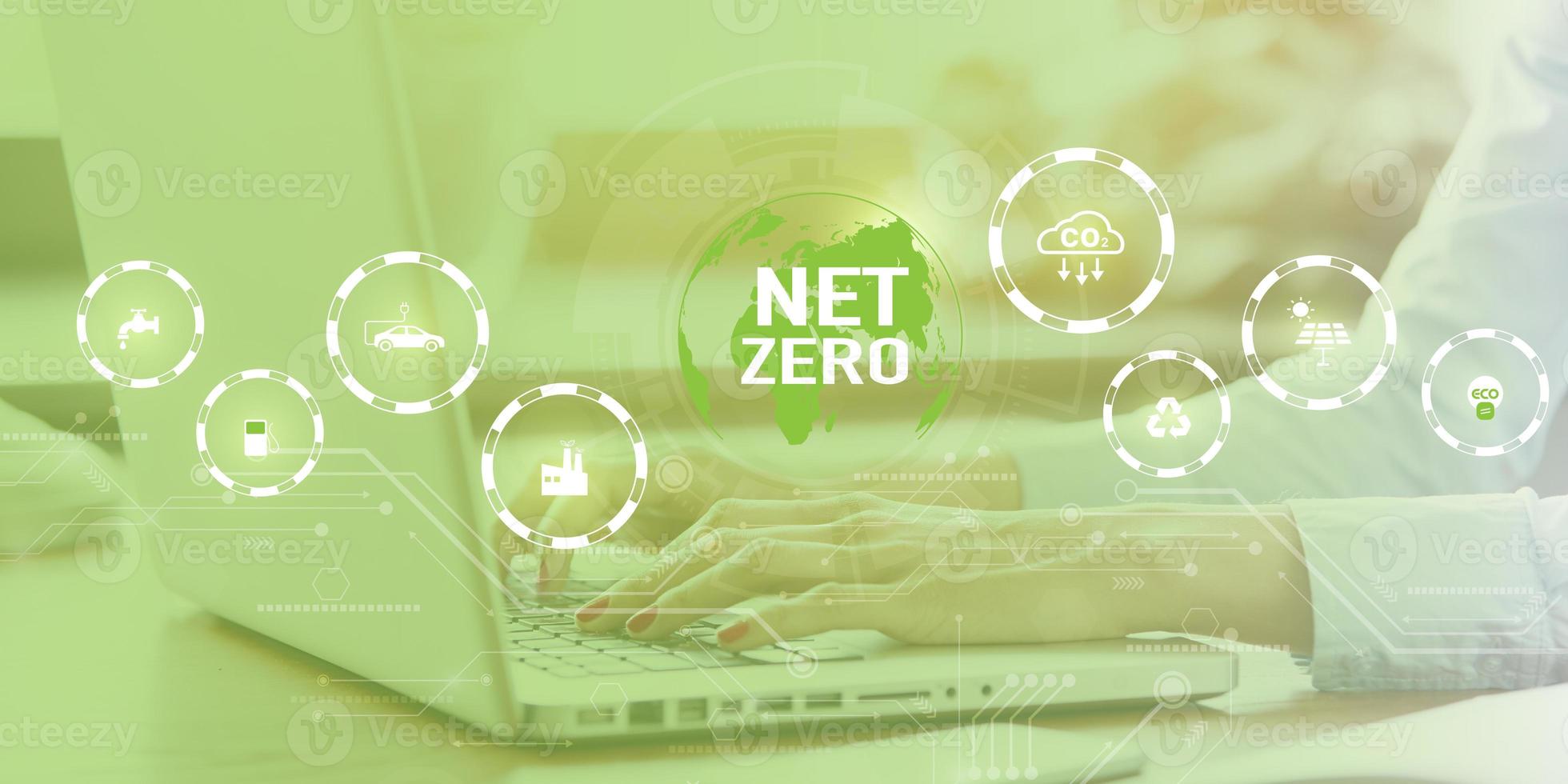 Businessman Holding icon Net Zero and Carbon Neutral Concepts Net Zero Emissions Goals With a connected icon concept related to Net Zero with hexagon grid. photo