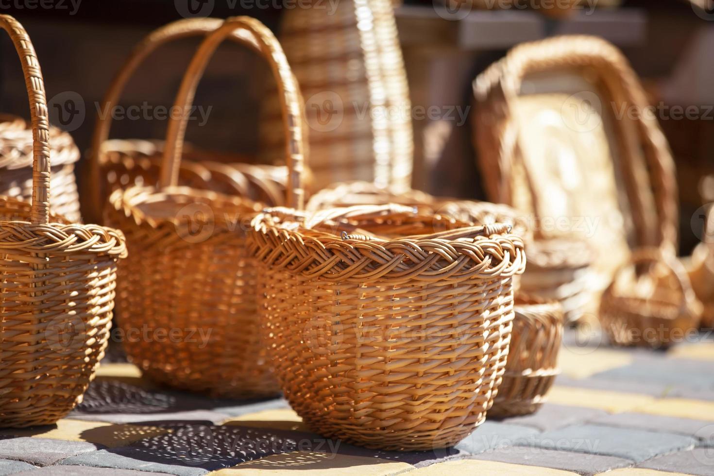 Many wicker baskets are sold. Products made of birch bark. photo