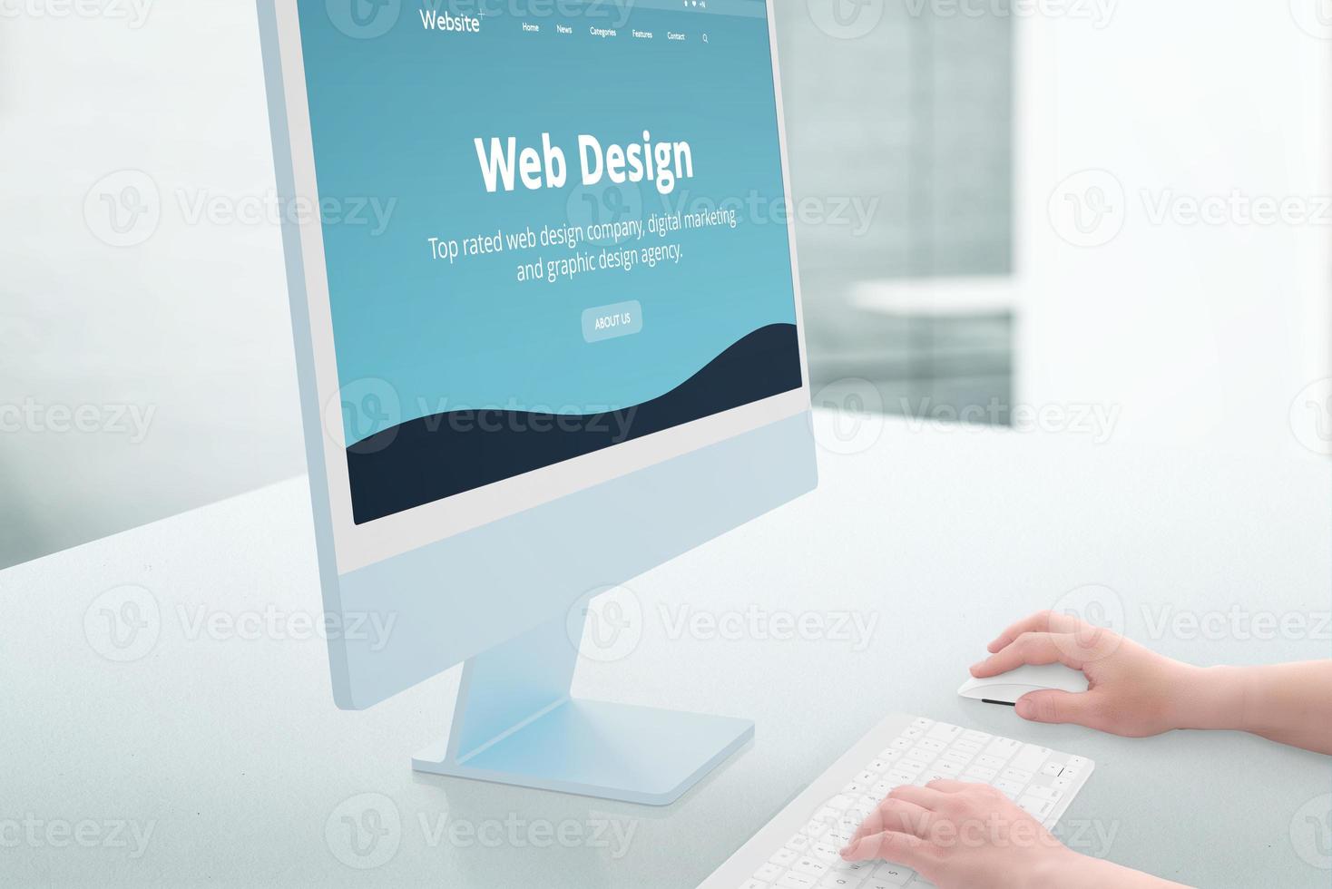 Web design studio showcase on modern computer display. Woman hands use keyboard and mouse. Studio office in background photo