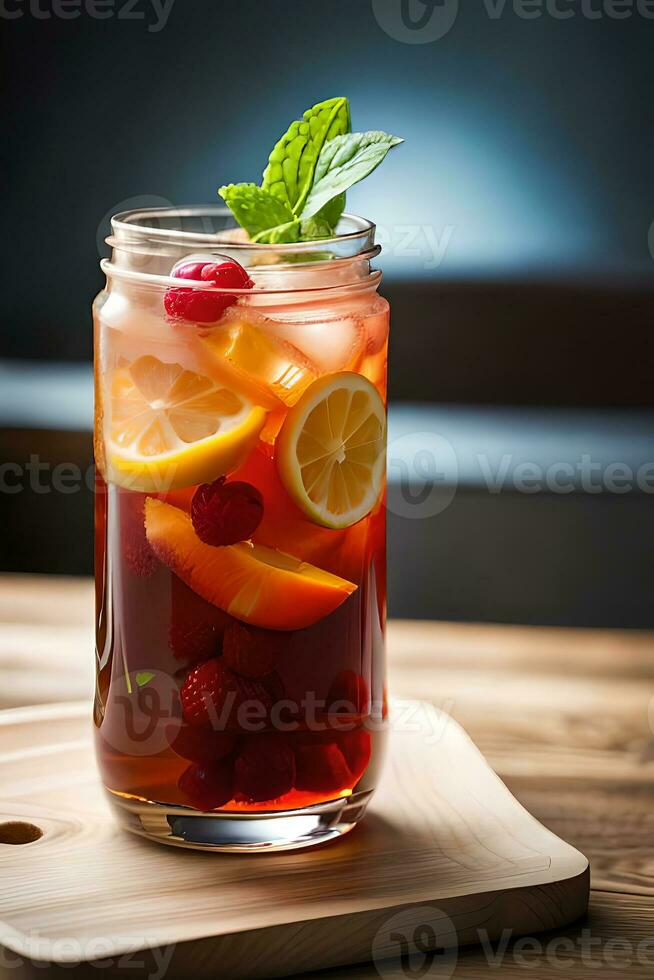 Refreshing Fruity Summer Drink on Table with Lemon and Mint photo