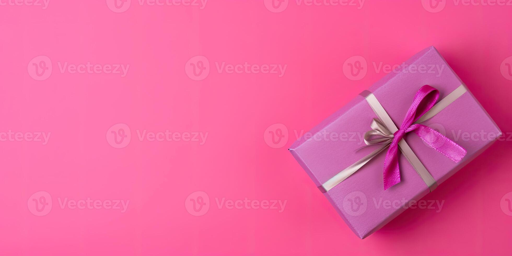 Colorful wrapped gift on a solid color background, with copy space, photo