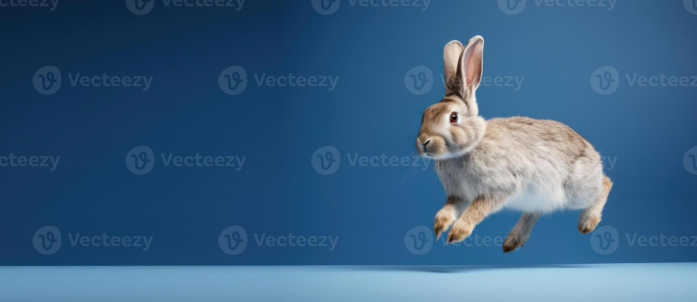 Cute Rabbit isolated on blue background, Banner with copy space. Created photo