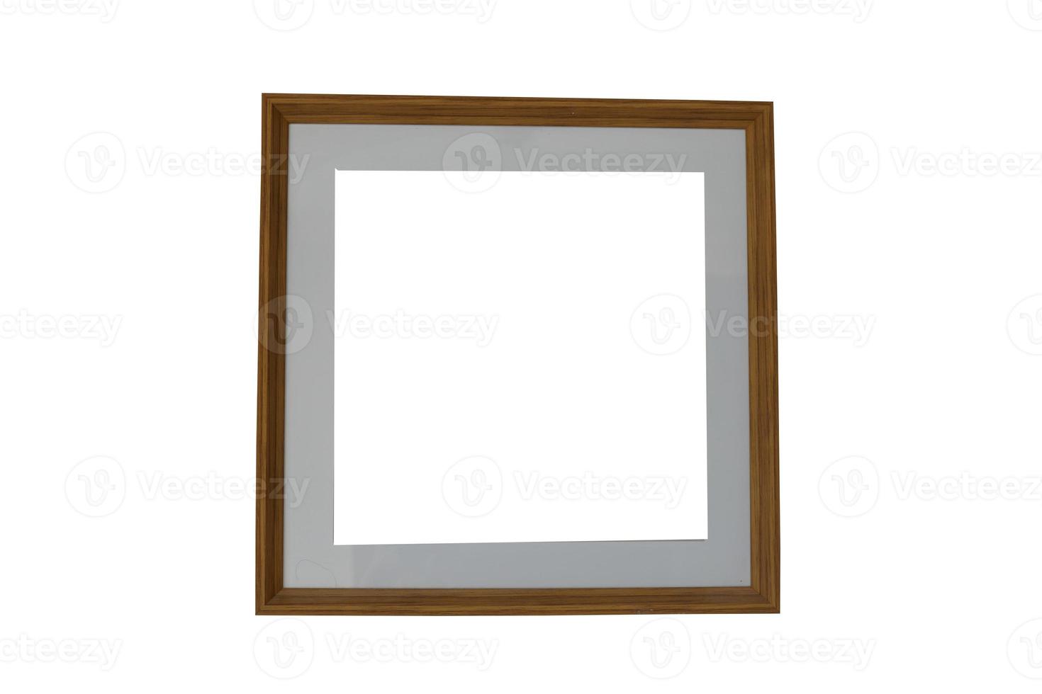 isolated wooden photo frame with gray inner border on white background. soft and selective focus.