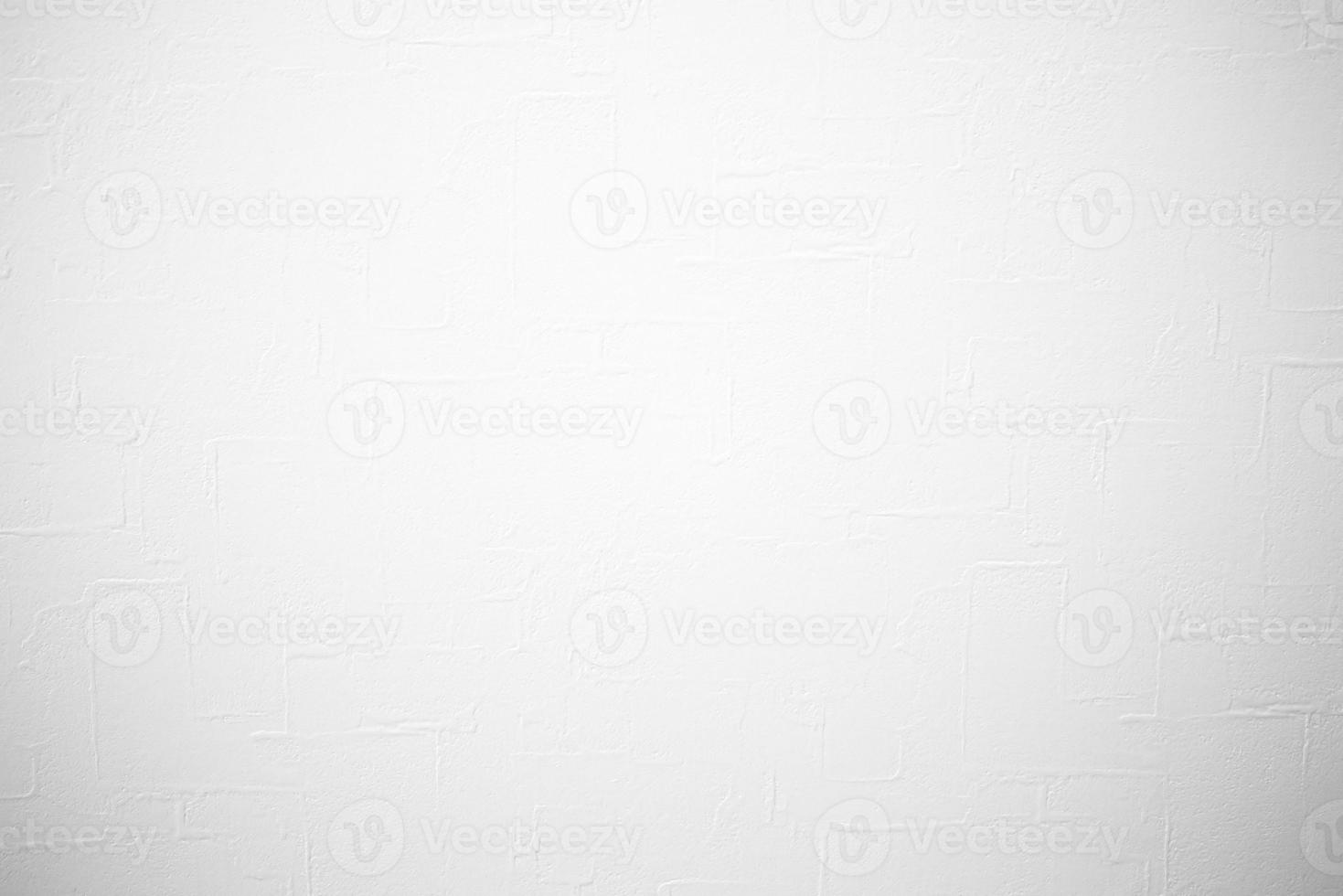 Unfinished Stucco Wall Texture Backdrop and White Spotlight on the Surface. photo