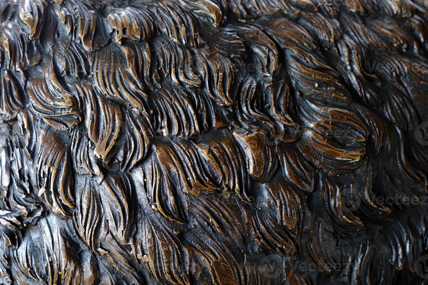 Close up Fur of Bronze Bear Statue Texture Background. photo