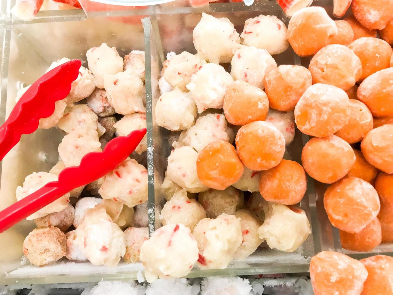 fresh raw meatballs and chicken nugget ready to be cooked photo