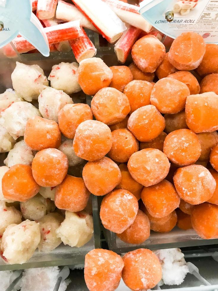 fresh raw meatballs and chicken nugget ready to be cooked photo