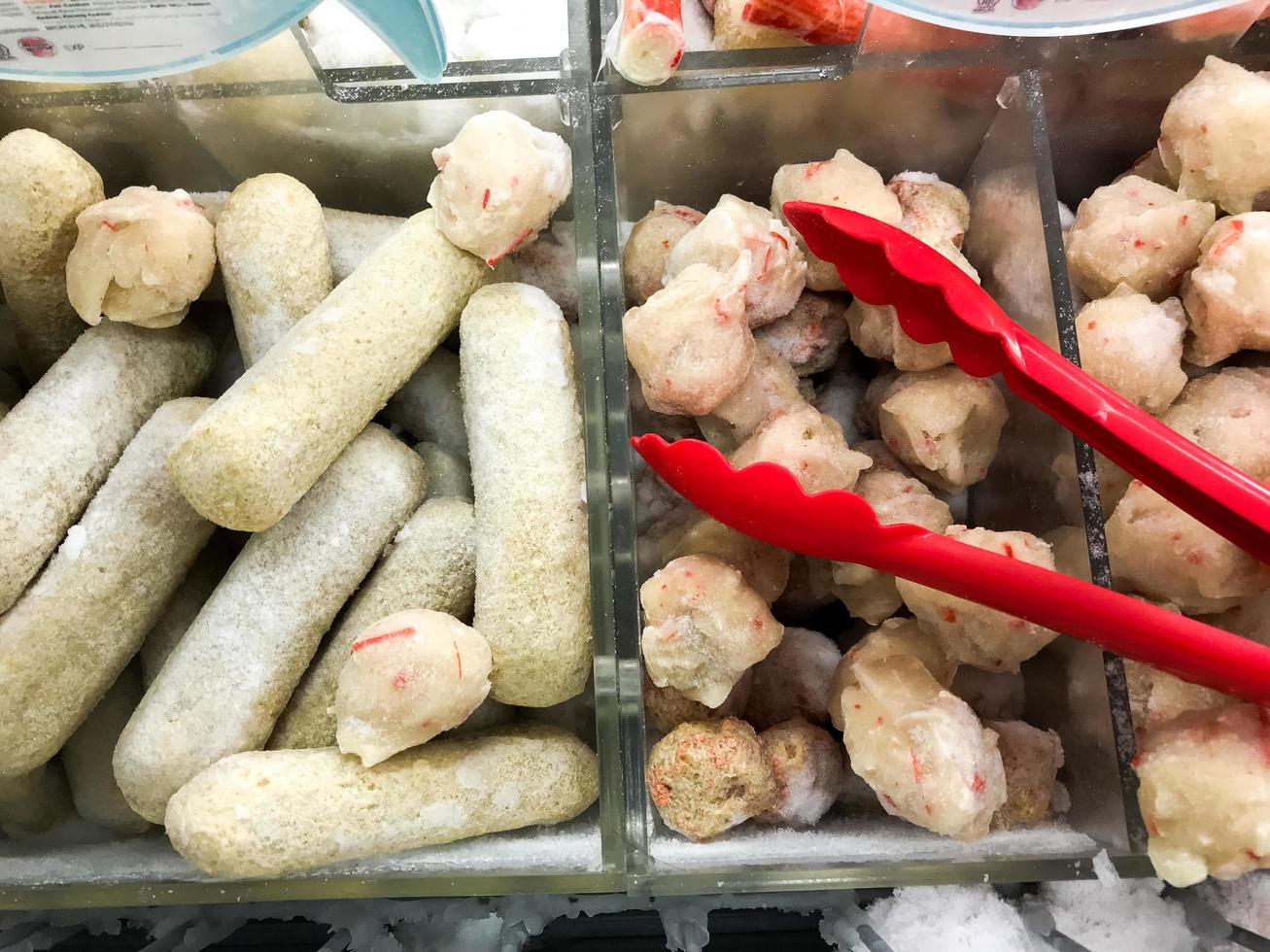 fresh raw meatballs and chicken nugget ready to be cooked photo