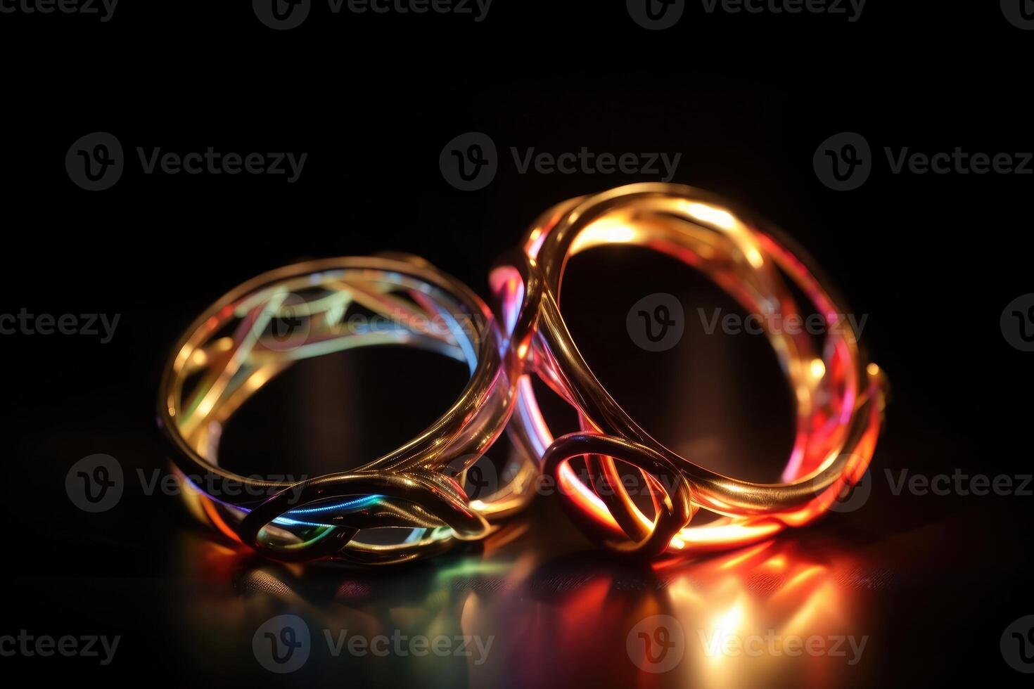 Two wedding rings made of light and energy created with technology. photo