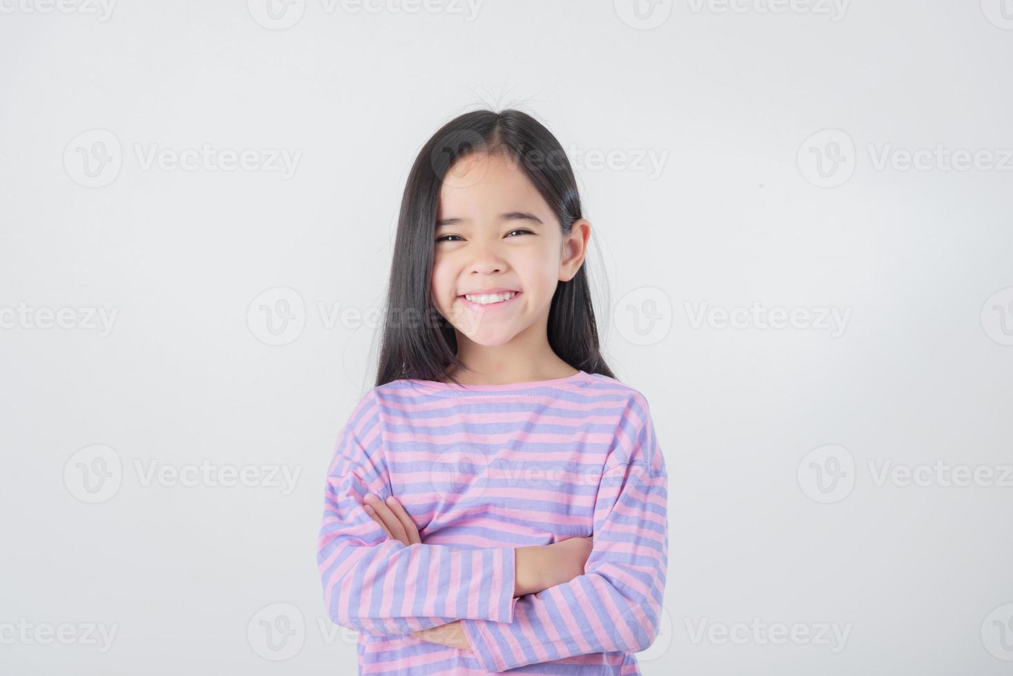 Image of Asian child posing on white  background photo