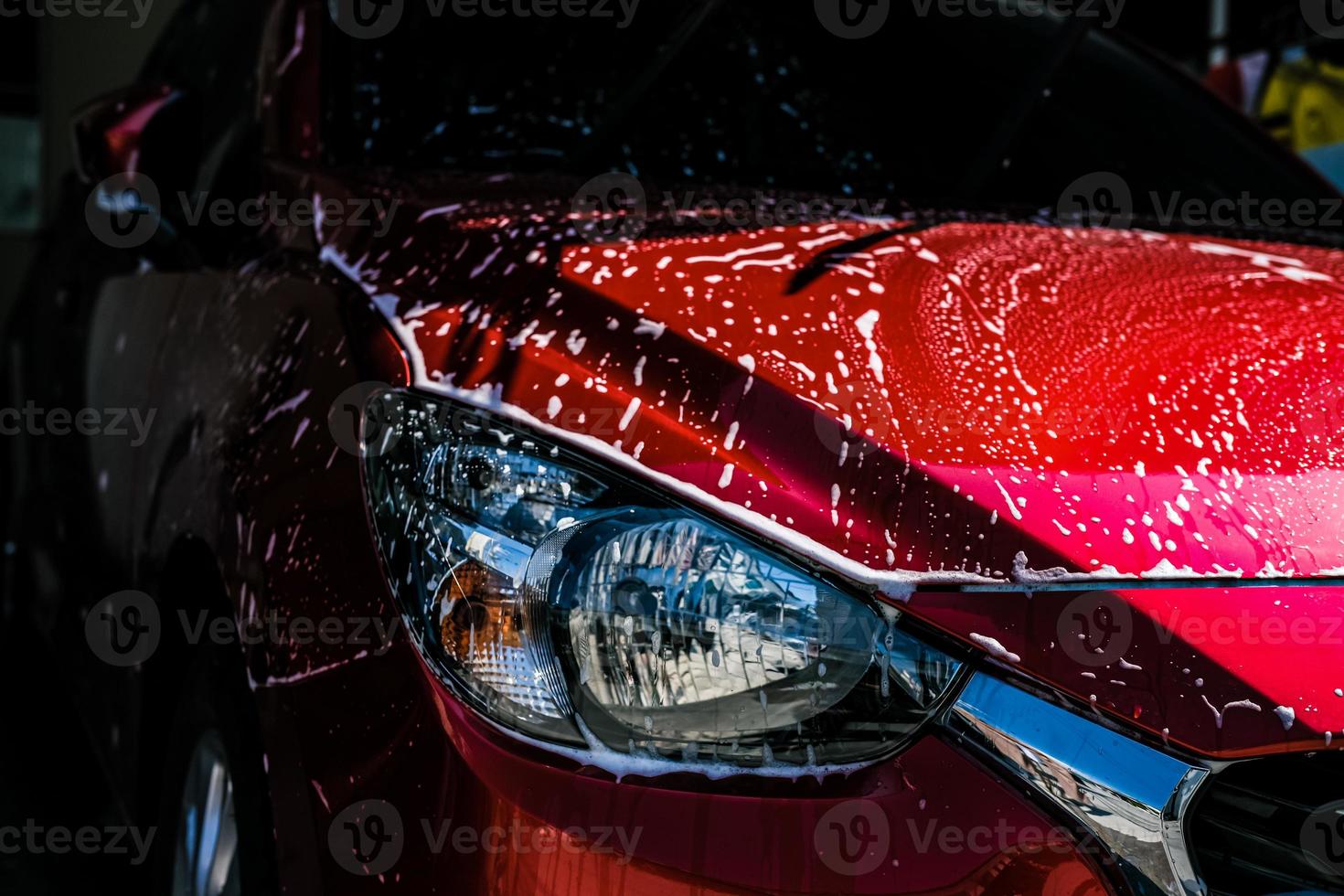 car wash headlamp and cleaning Equipment car wash With red car For