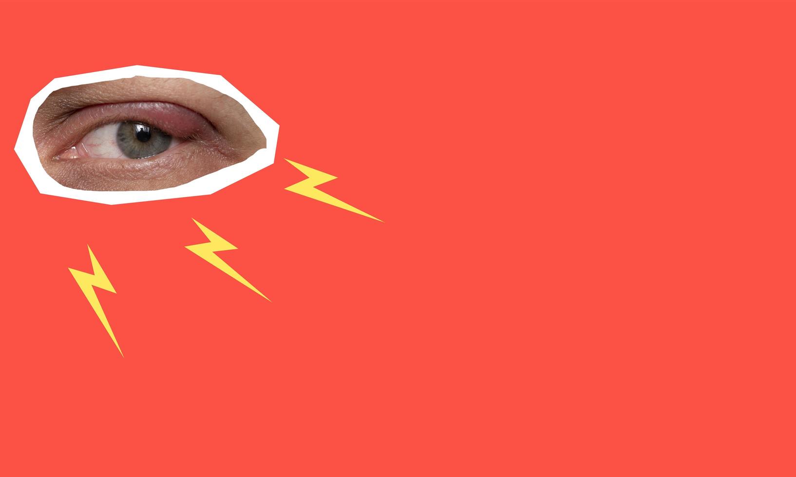 Contemporary art collage of sparks from the eye on a red background. photo