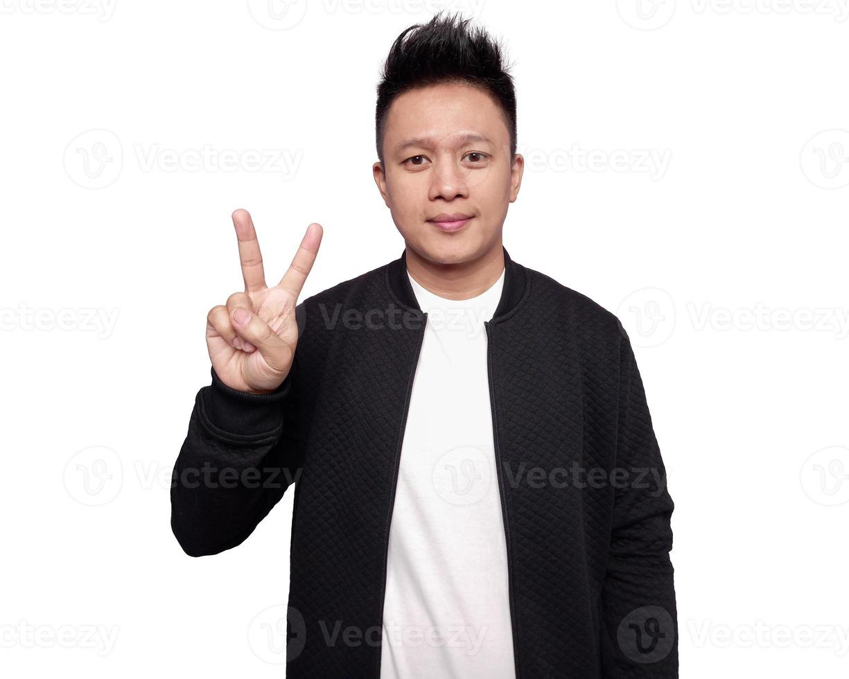 Man with two or peace hand gesture isolated on white. photo