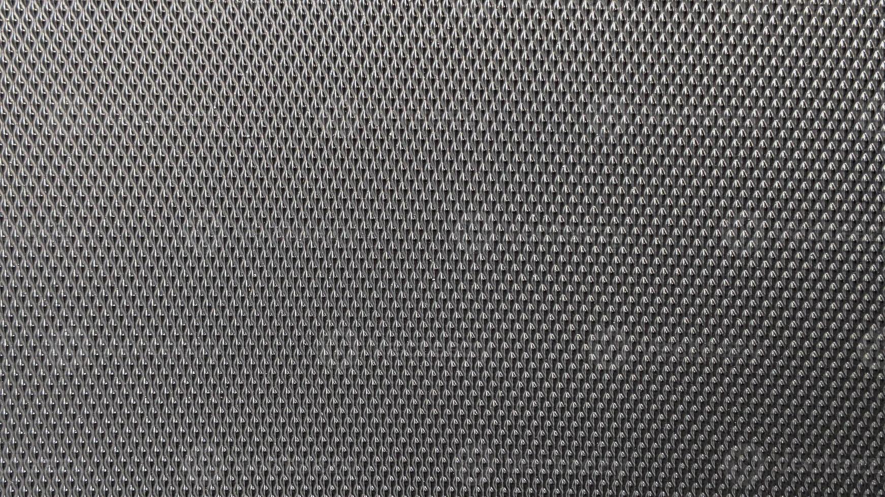 Abstract carbon fiber fabric, with black carbon fiber texture. photo