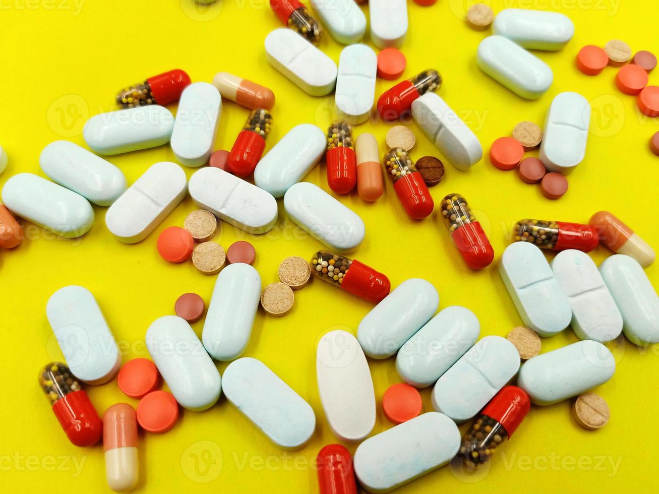 Assorted pharmaceutical medicine pills, tablets and capsules photo