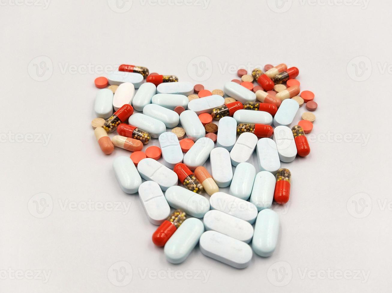 Assorted pharmaceutical medicine pills, tablets and capsules photo