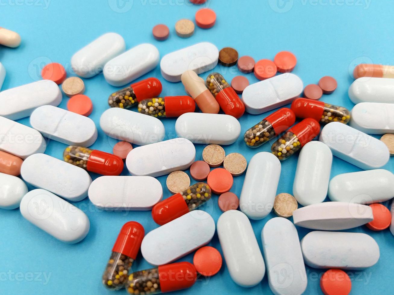 Assorted pharmaceutical medicine pills, tablets and capsules photo