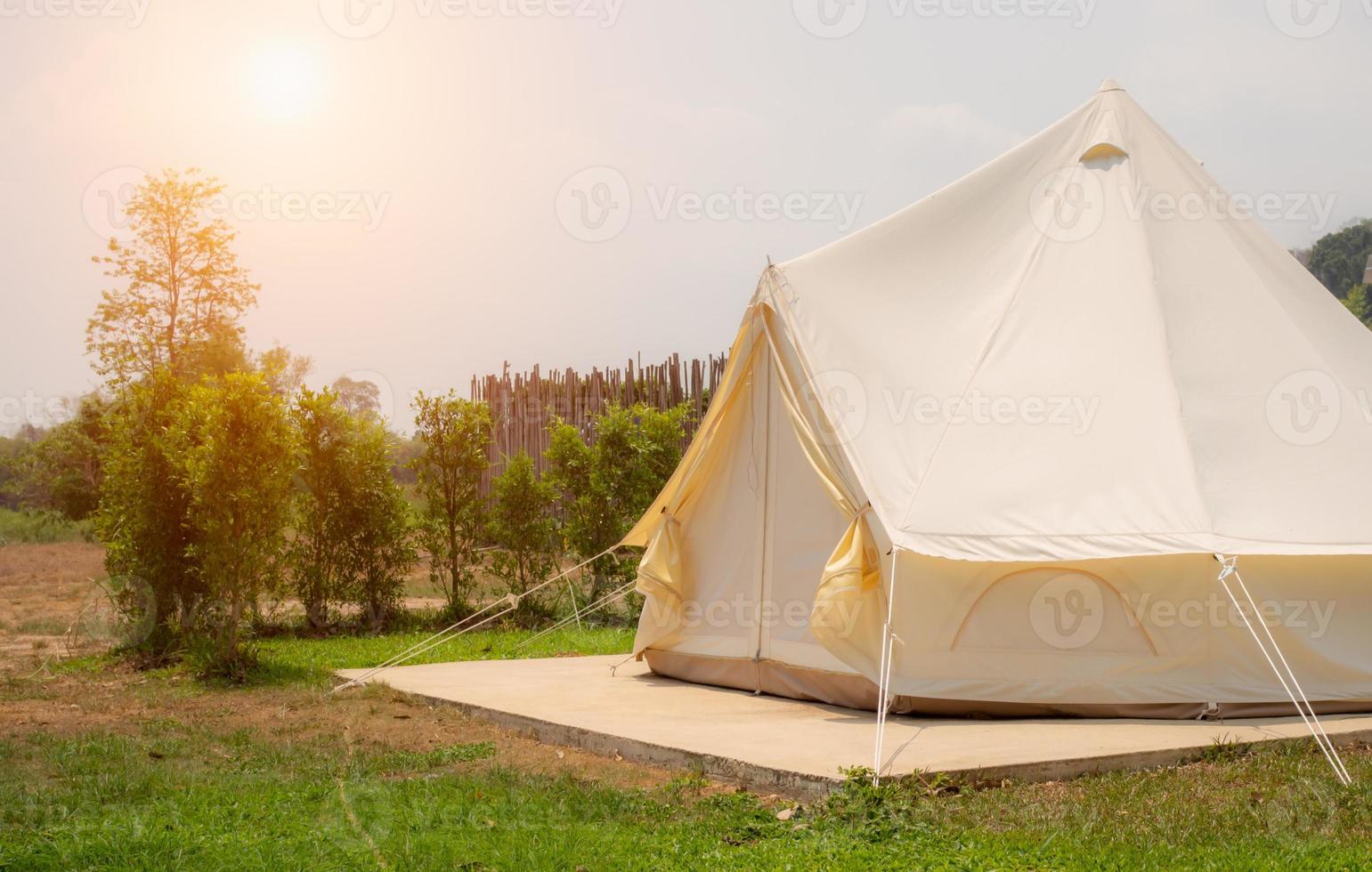 Camping picnic tent campground in outdoor hiking forest. Camper while campsite in nature background at summer trip camp. Adventure Travel Vacation concept photo