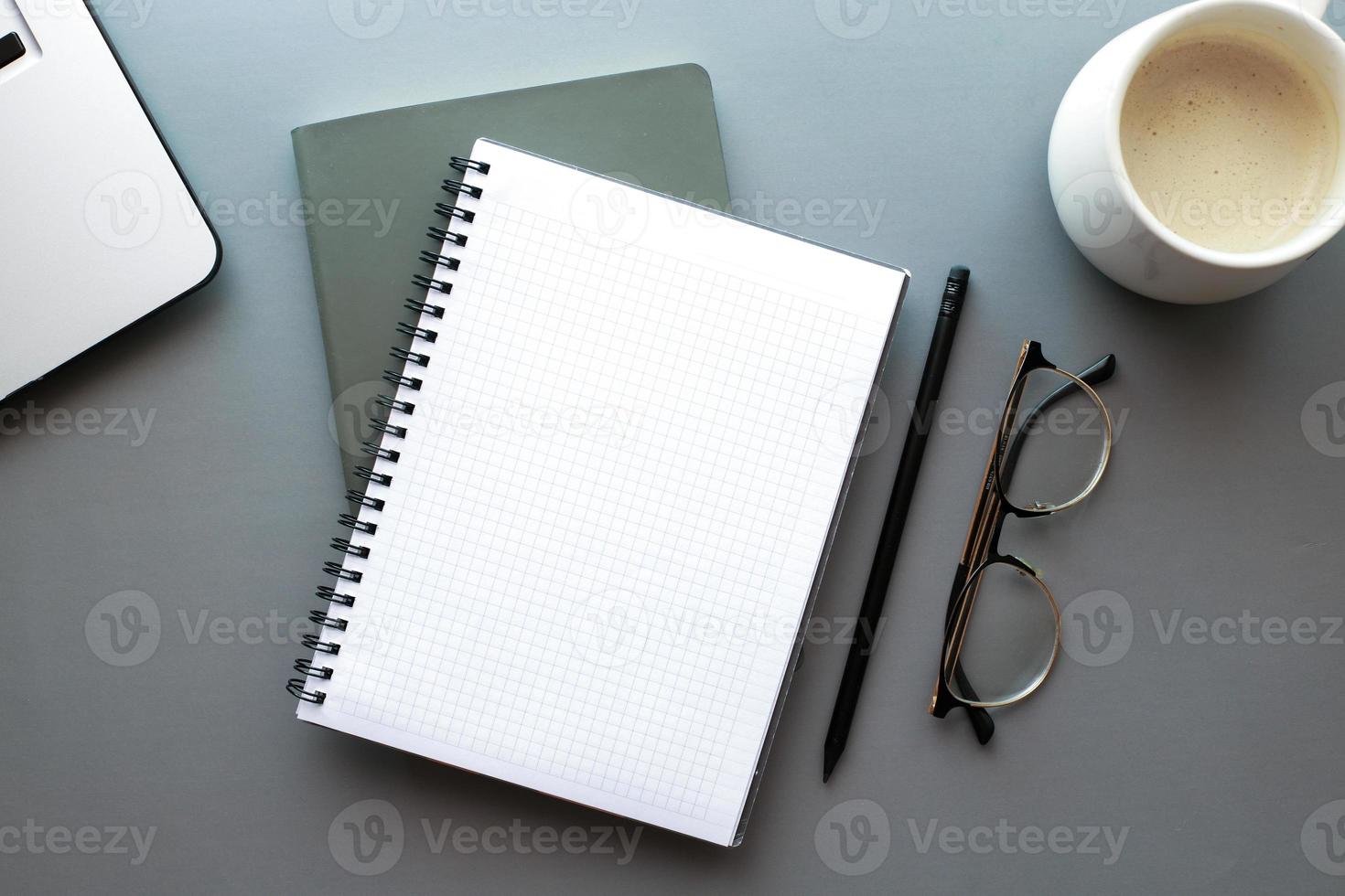 Mockup notebook on desktop flat lay photo