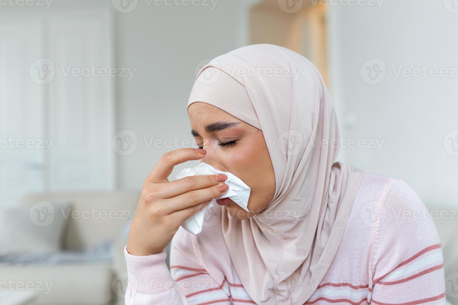 Depressed Muslim lady in hijab headscarf, sadness and frustration, crying woman, despair emotions expression The life of a woman in the Muslim world is doomed to live in fear and suffering. photo