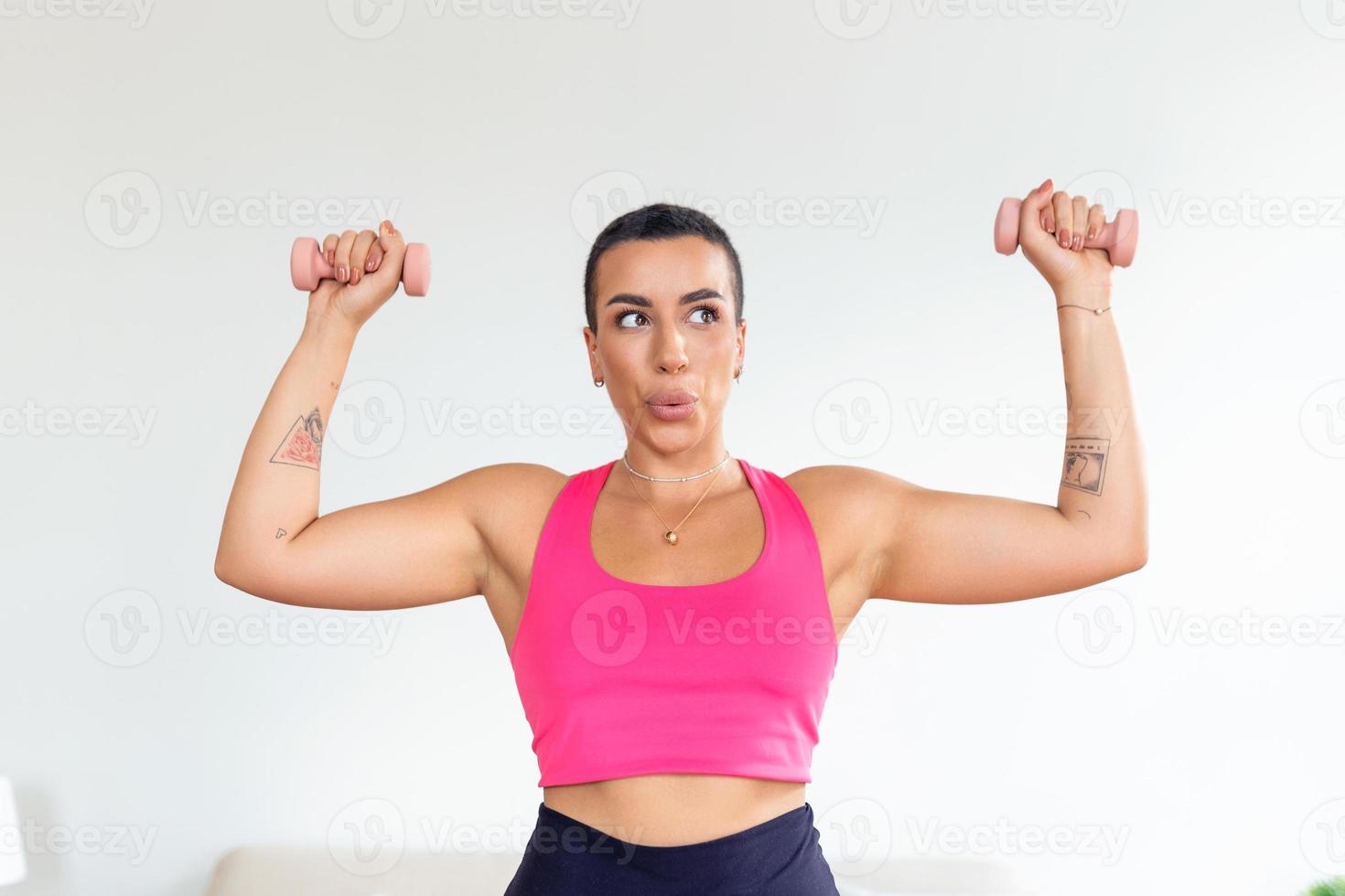 Biceps Exercises, Arms Workout. Confident Black Sportswoman Doing Training With Two Blue Dumbbells, Banner, Blurred Background. Portrait Of Smiling Strong Fit Lady In White Sportswear Bra Top photo