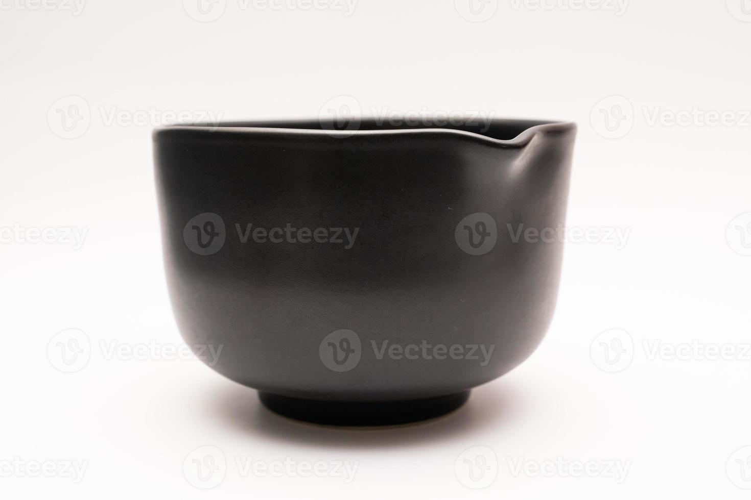 Black ceramic cup on with white background photo