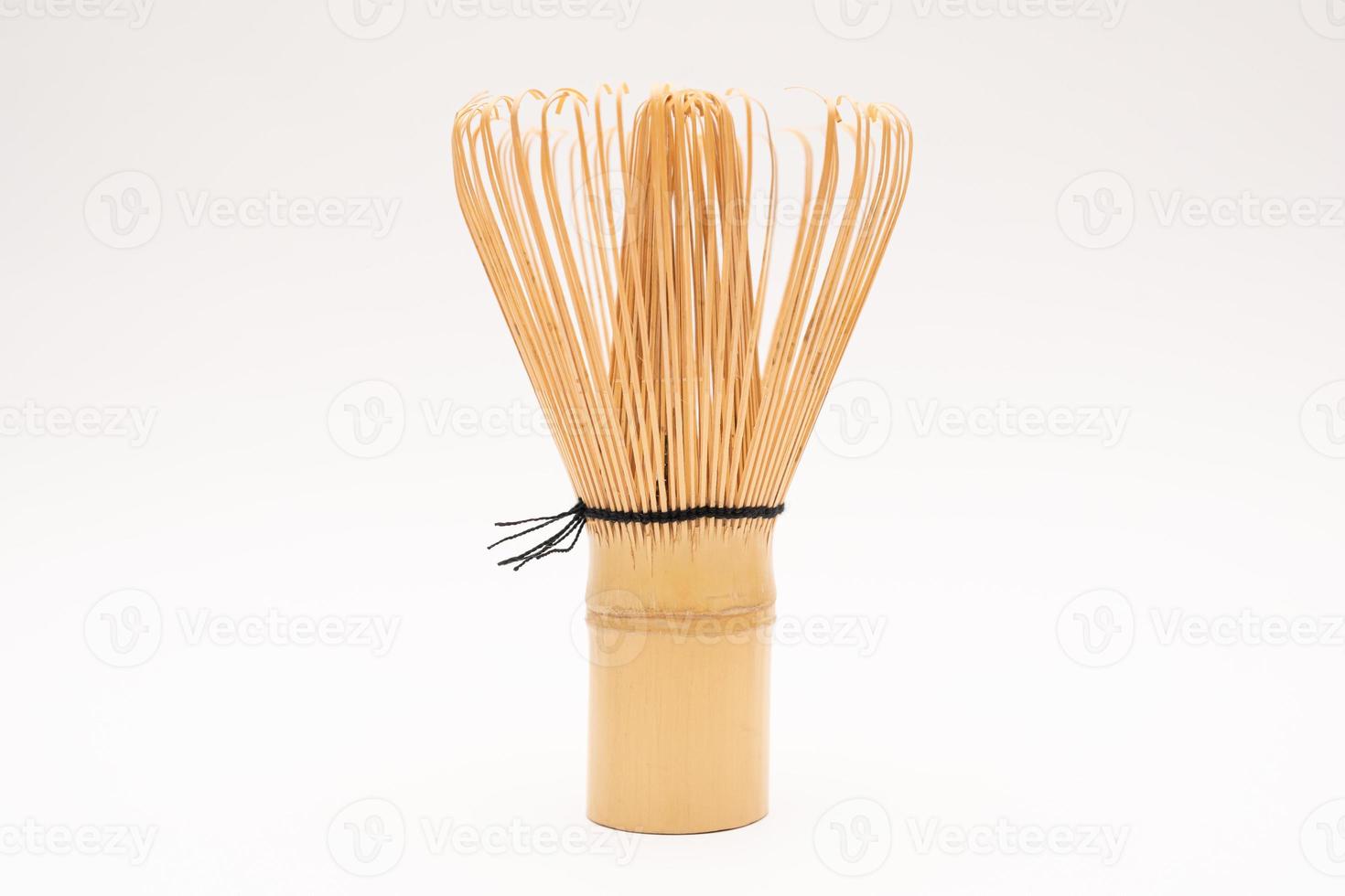 Japanese Bamboo Brush Tea Whisk or Chasen isolated on White Background. Japanese bamboo tea whisk. selective focus. photo