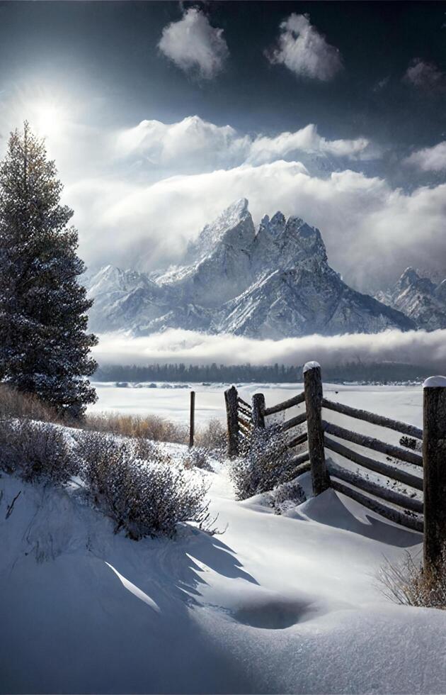 fence in the snow with a mountain in the background. . photo
