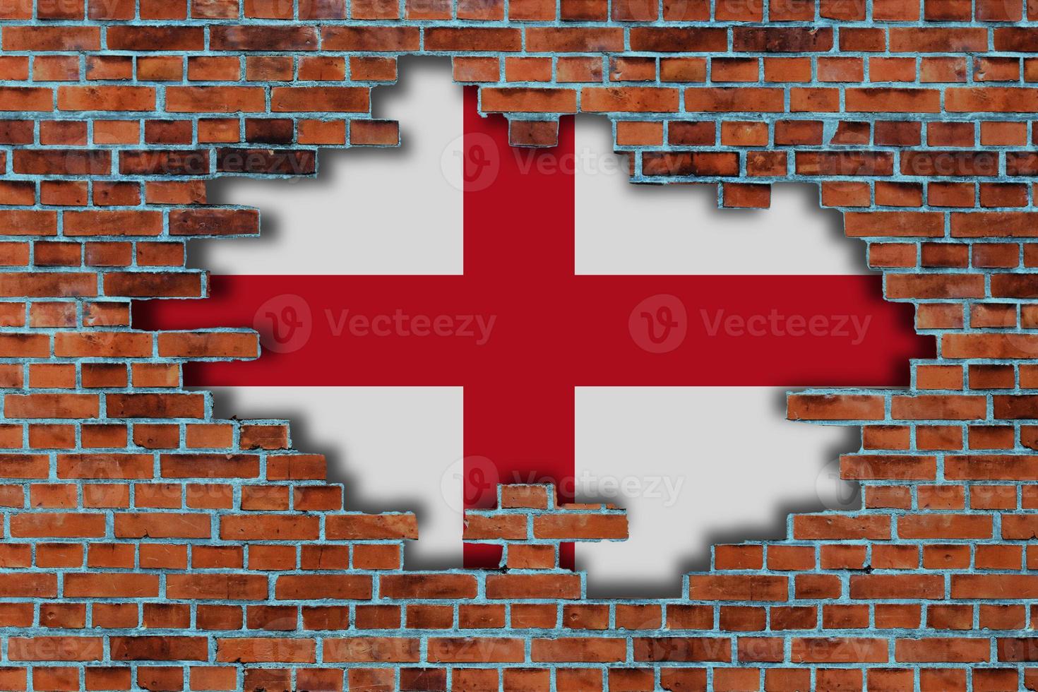 3D Flag of England behind the broken old stone wall background. photo